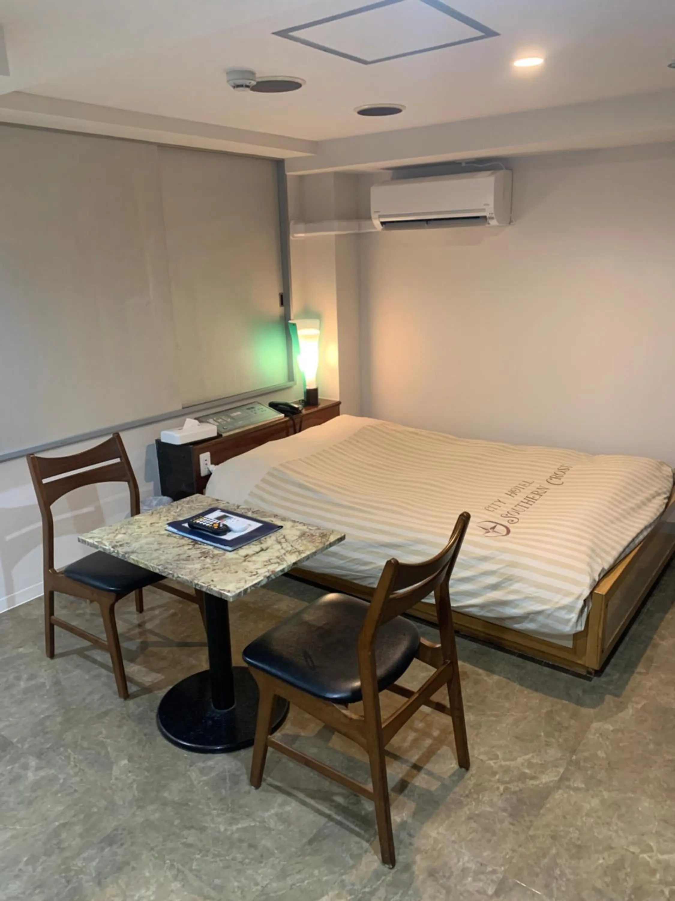 Bed in City Hotel Southern Cross