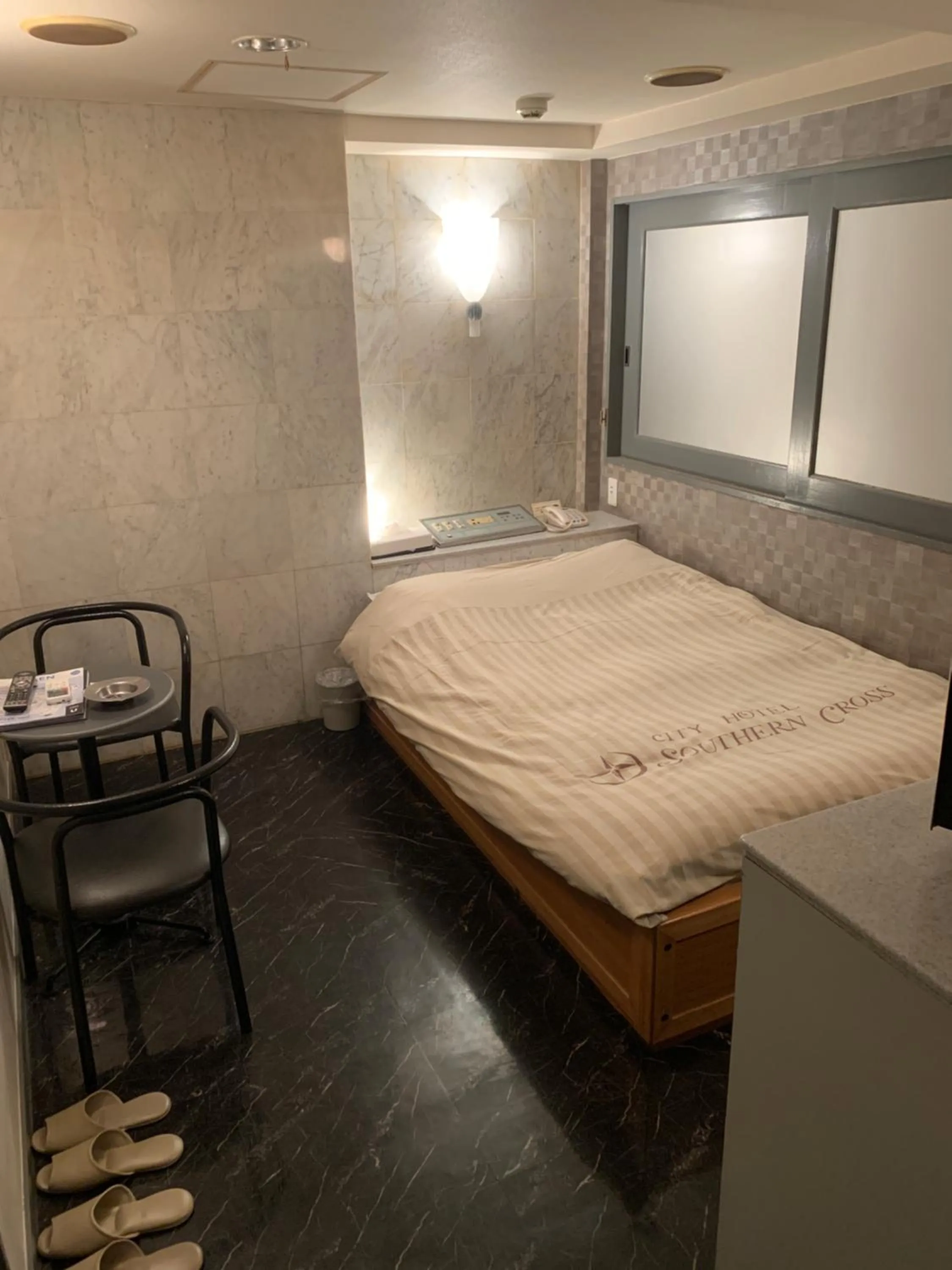 Bed in City Hotel Southern Cross