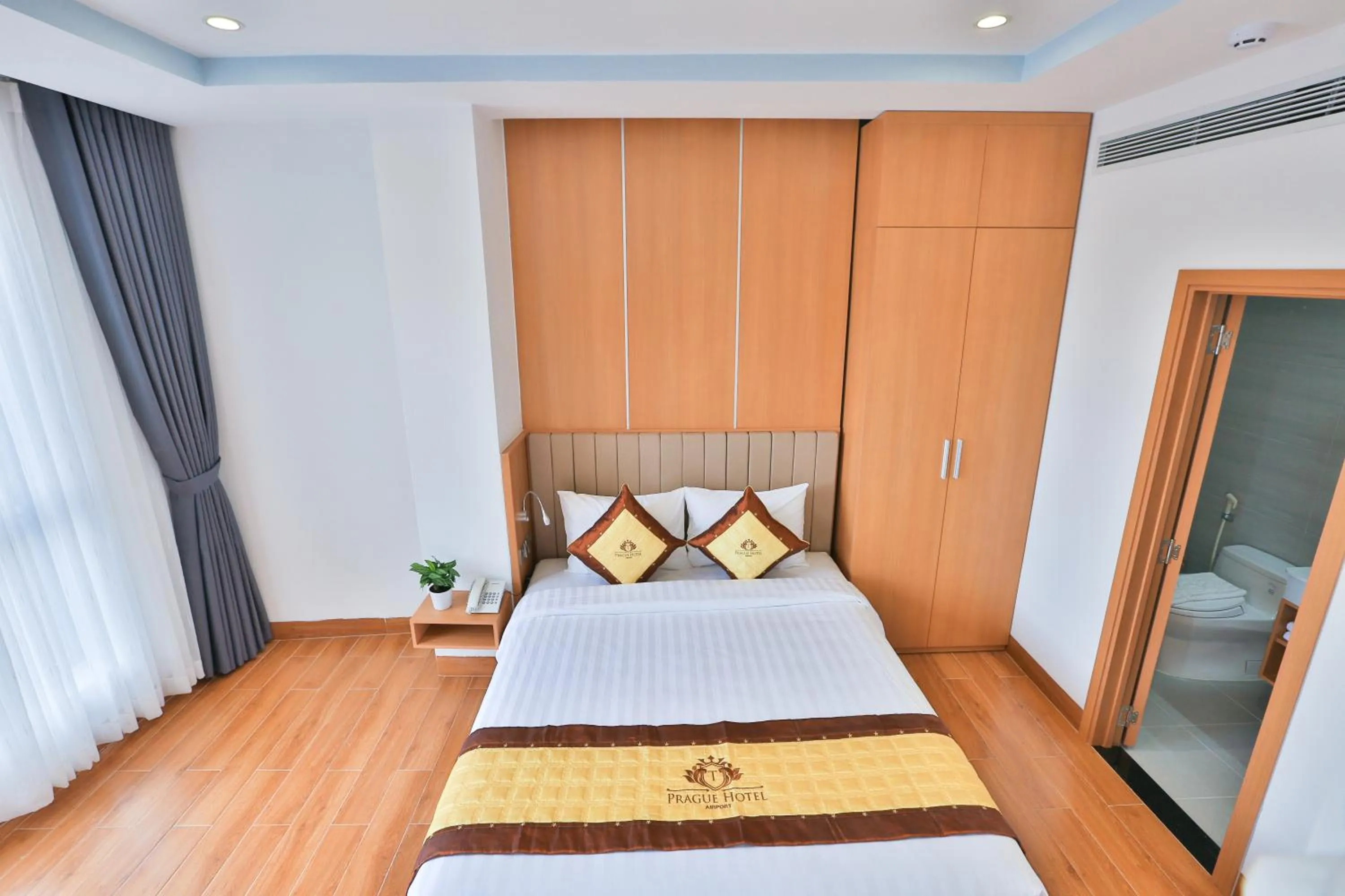 Bathroom, Bed in Prague Saigon Airport Hotel