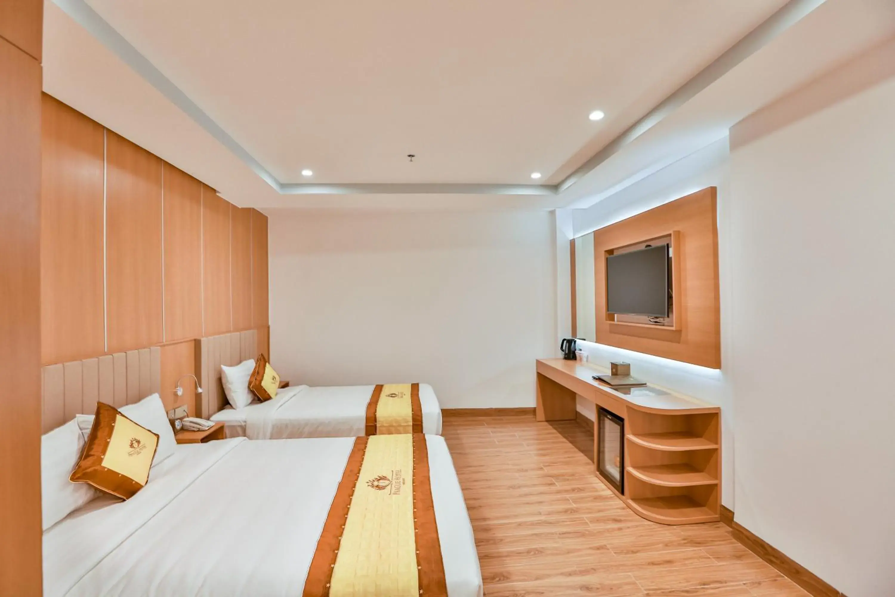 Communal lounge/ TV room, Bed in Prague Saigon Airport Hotel Communal lounge/ TV room, Bed in Prague Saigon Airport Hotel