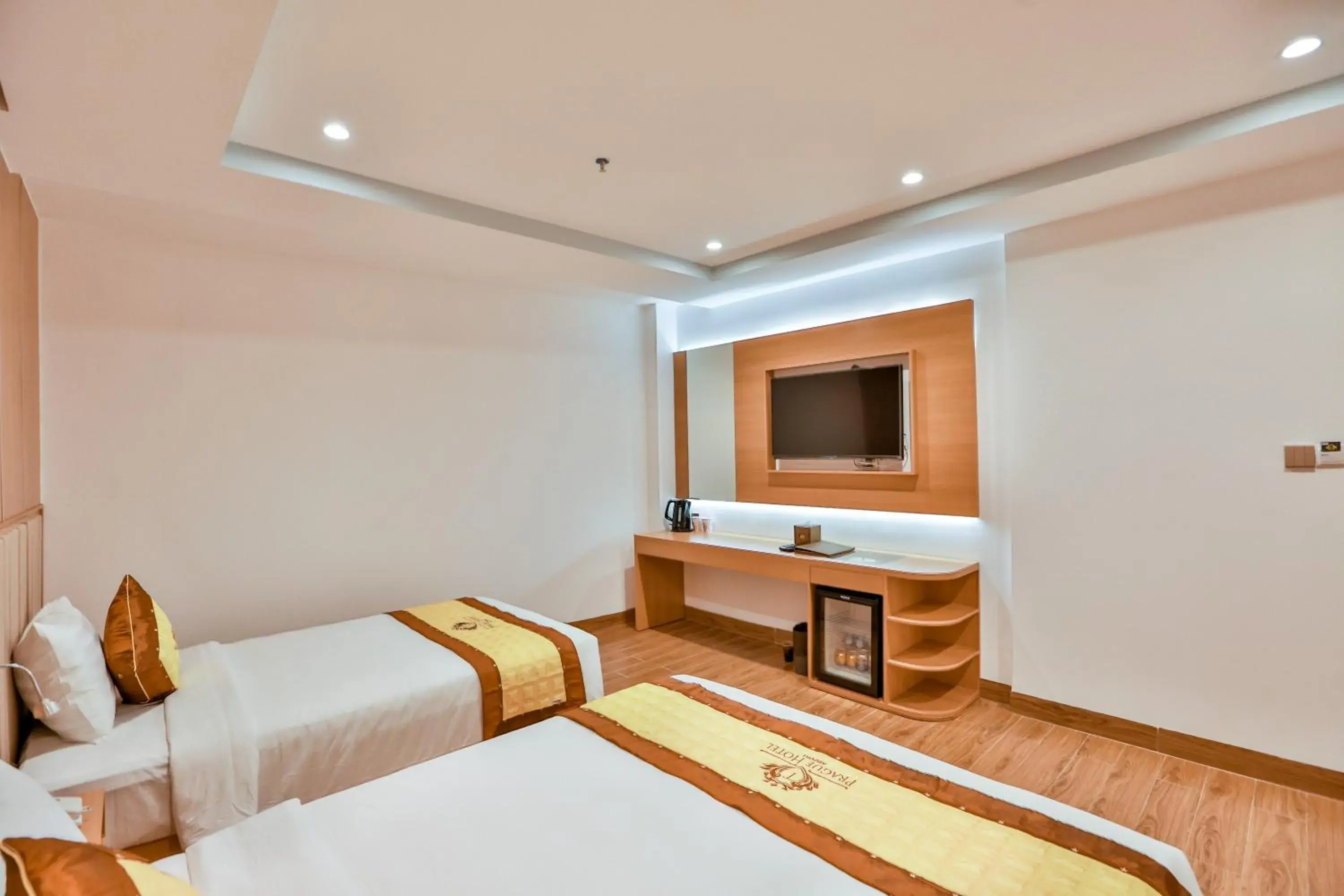 TV and multimedia, Bed in Prague Saigon Airport Hotel TV and multimedia, Bed in Prague Saigon Airport Hotel