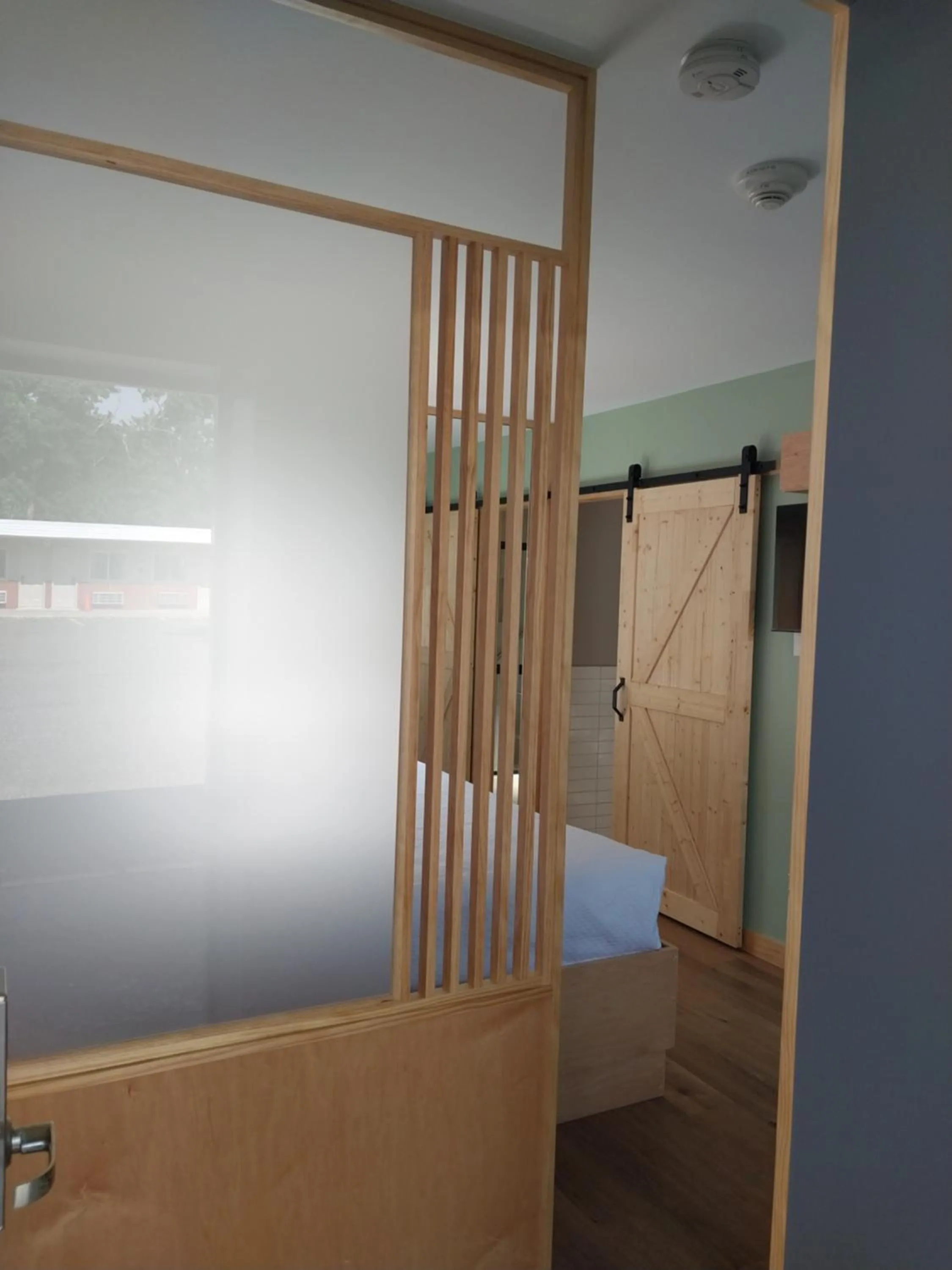 Bed in Greenview Inn Riverhead