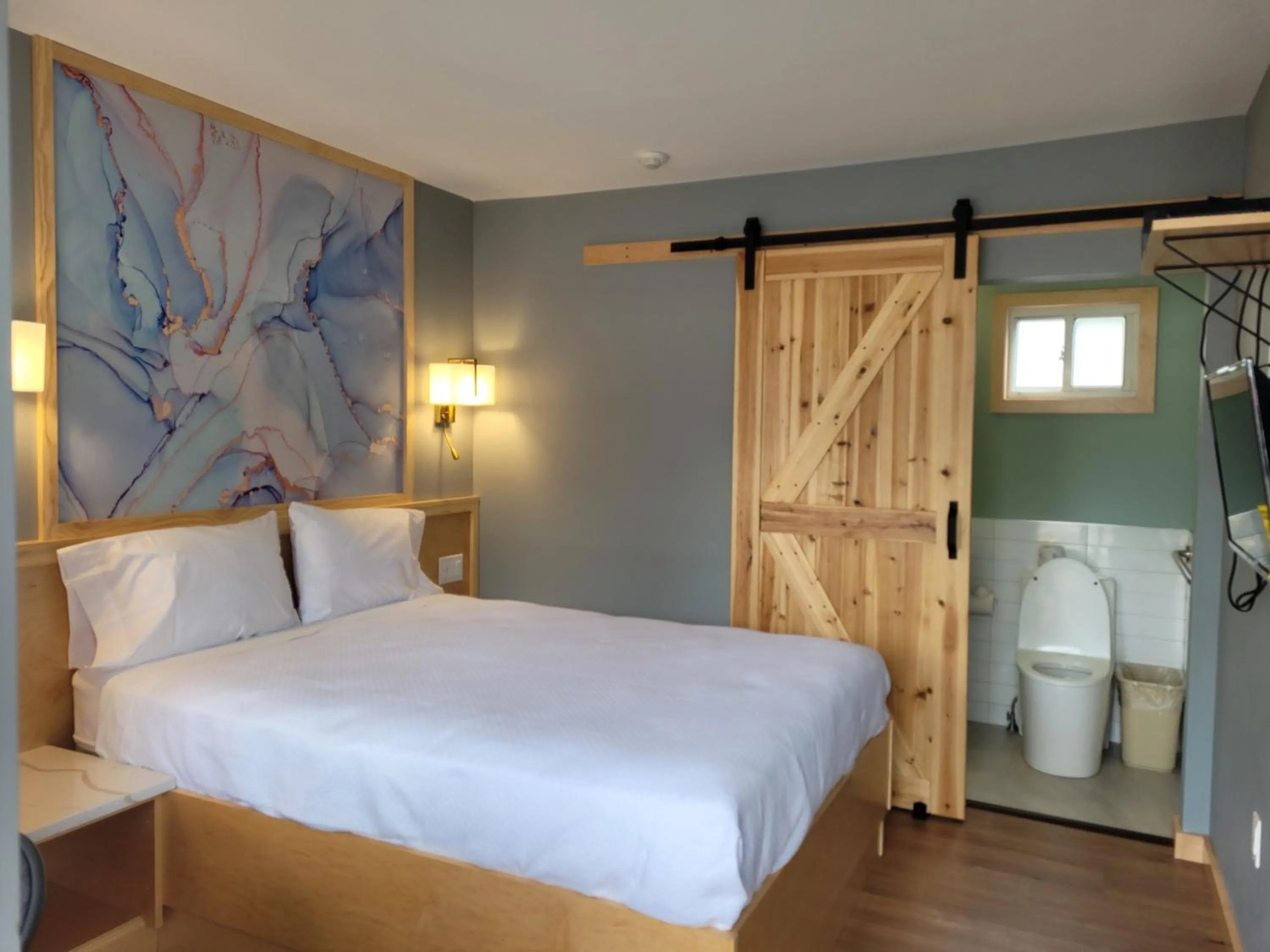 Bed in Greenview Inn Riverhead