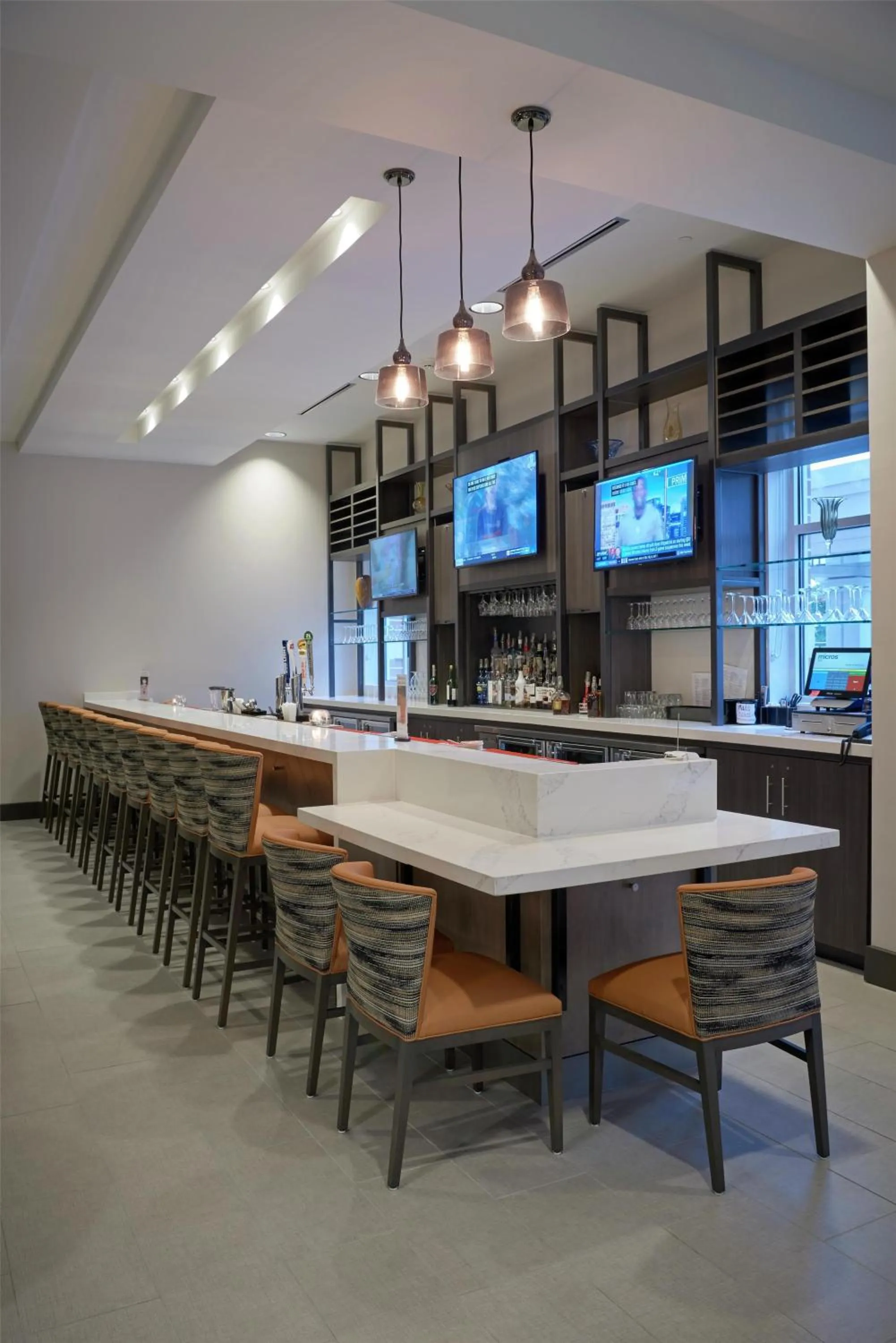 Lounge or bar in Hilton Garden Inn Corning Downtown