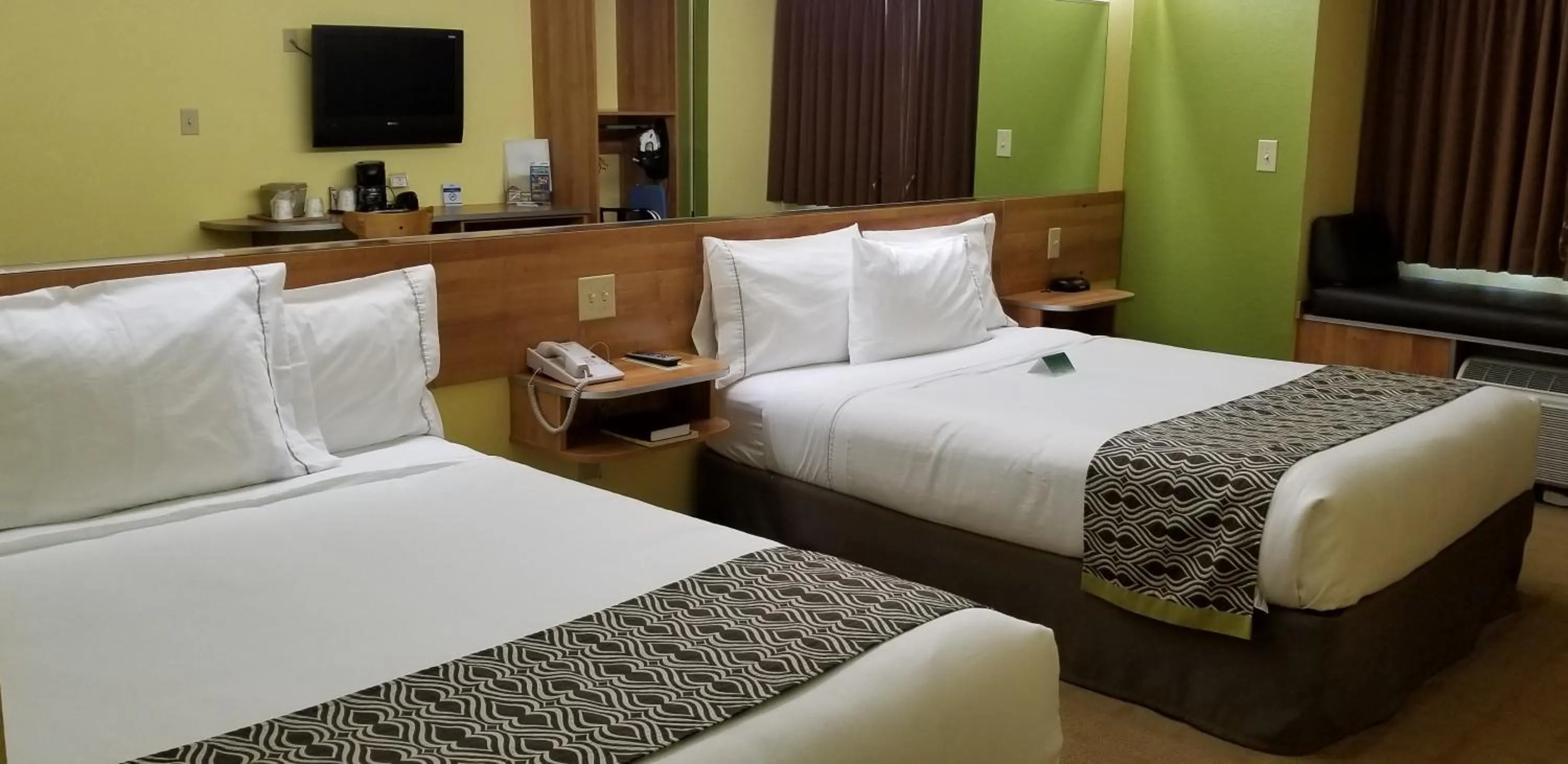 Bed in Microtel Inn & Suites by Wyndham Delphos