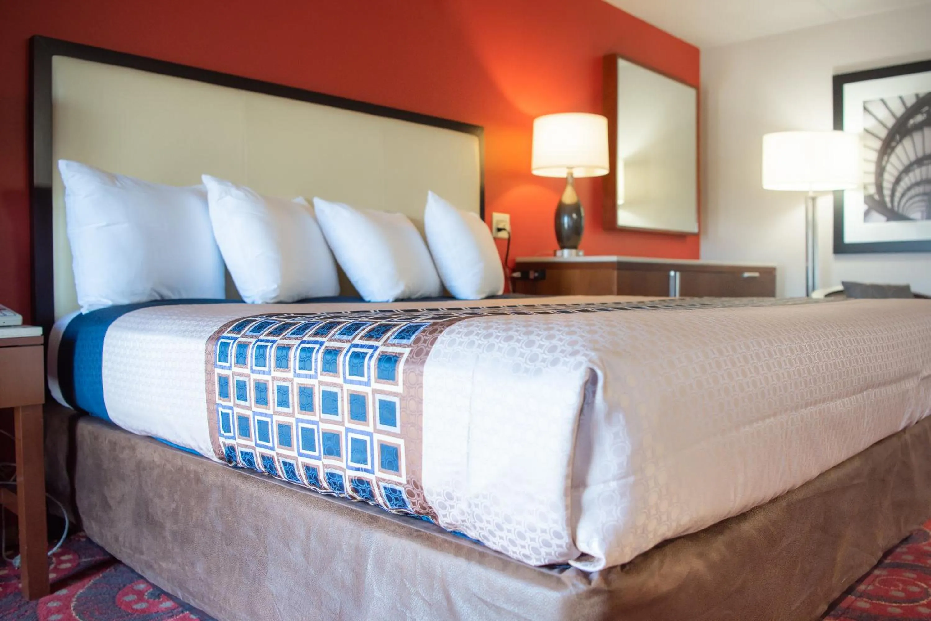 Bed in Spencer Inn & Suites