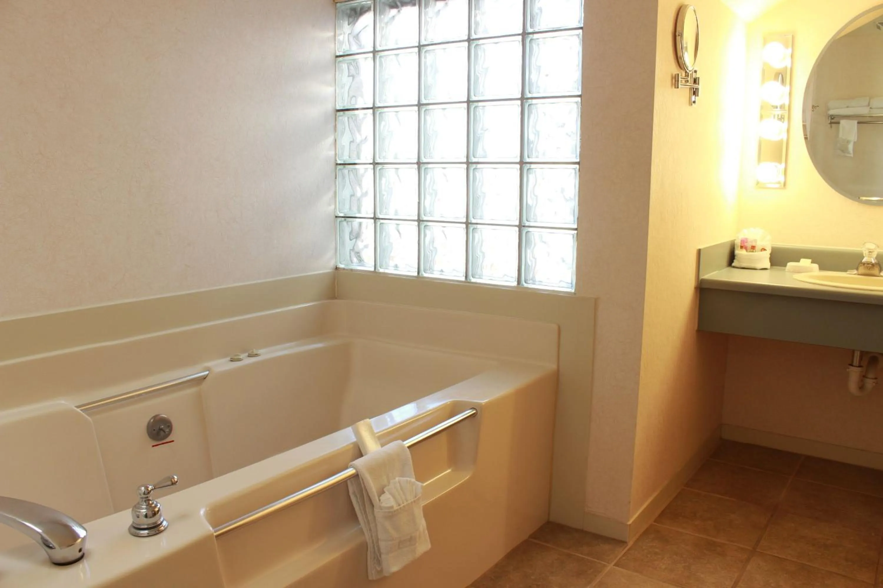 Bathroom in Red Arrow Inn & Suites, a Travelodge by Wyndham