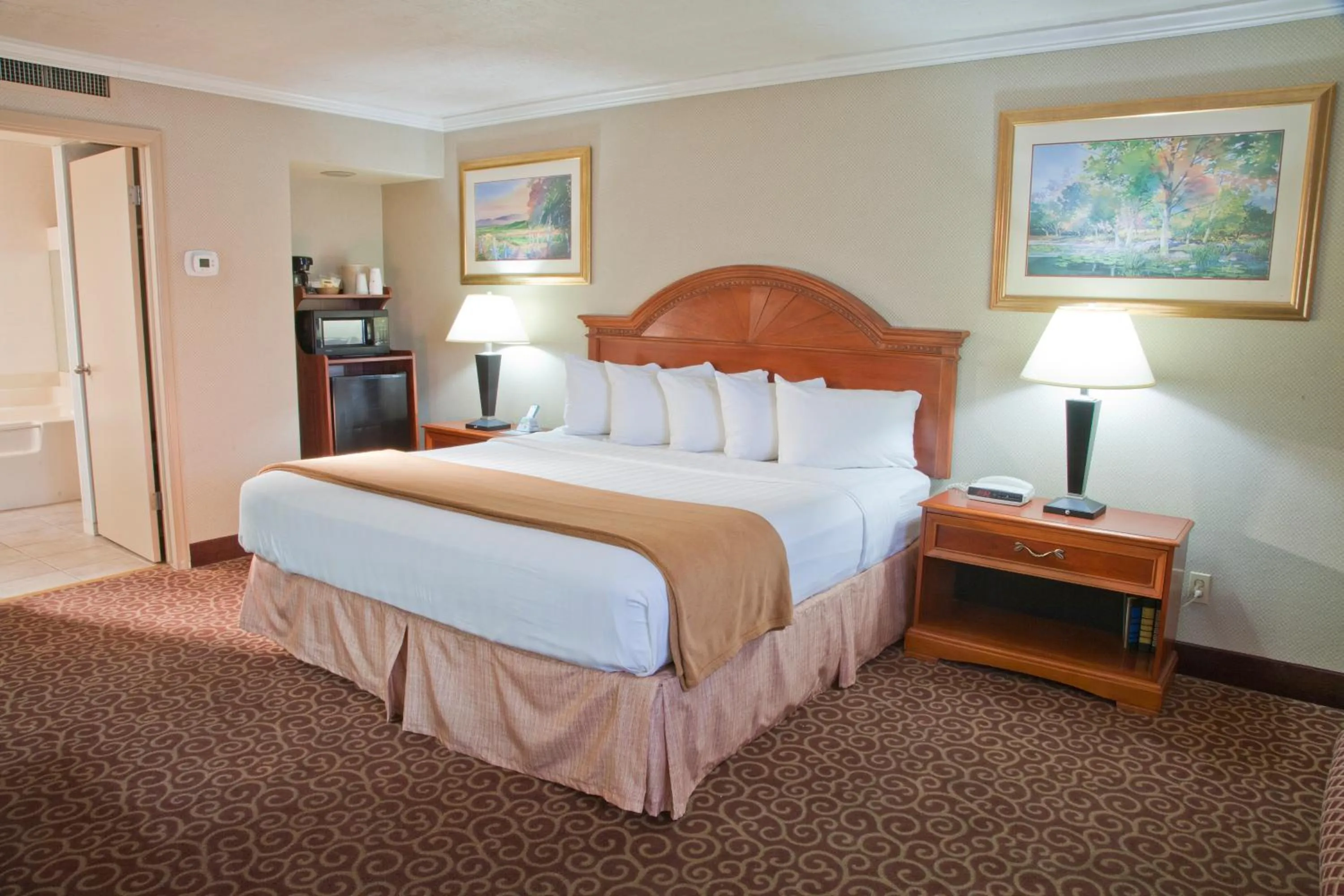 Bed in Red Arrow Inn & Suites, a Travelodge by Wyndham