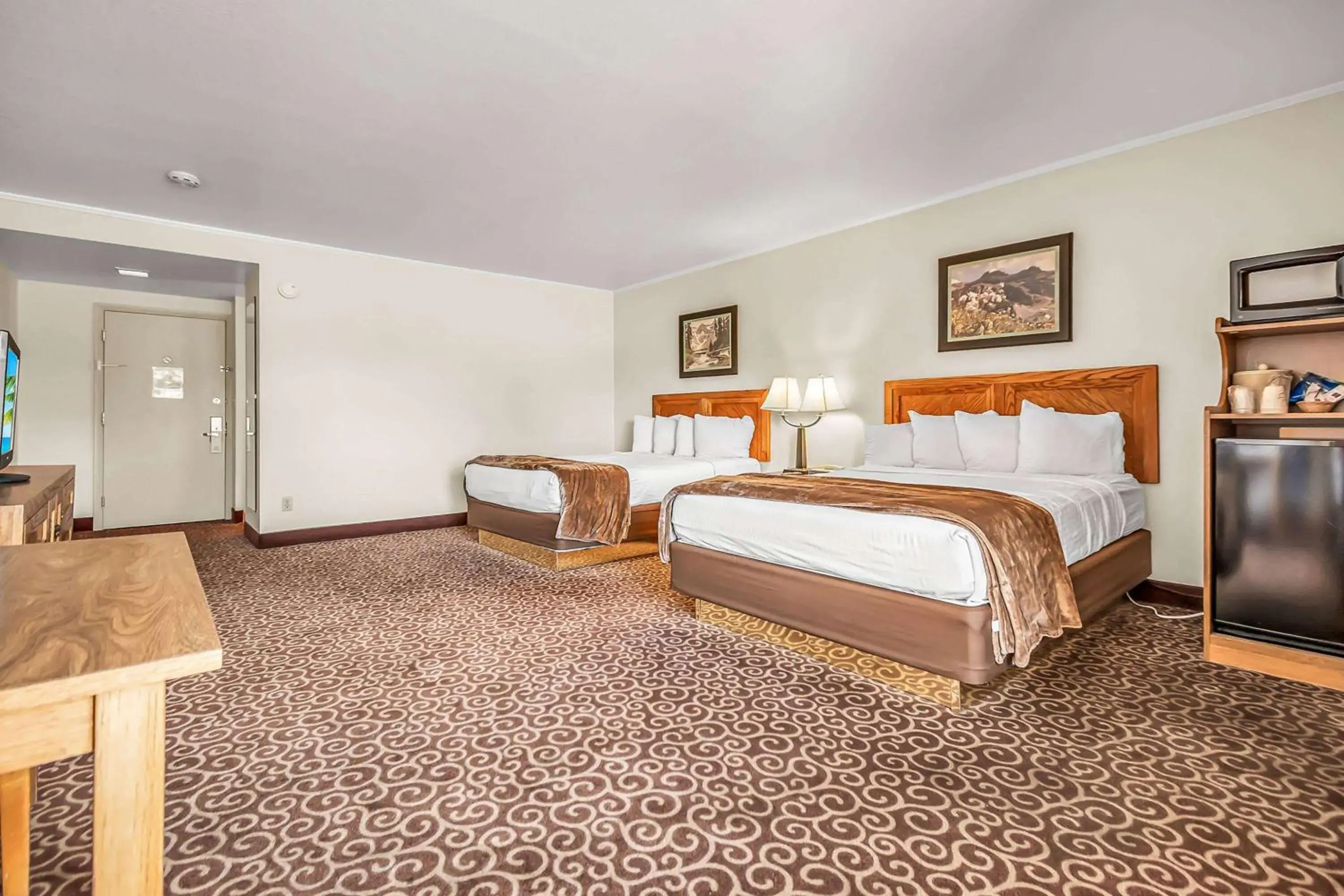 Photo of the whole room, Bed in Red Arrow Inn & Suites, a Travelodge by Wyndham Photo of the whole room, Bed in Red Arrow Inn & Suites, a Travelodge by Wyndham