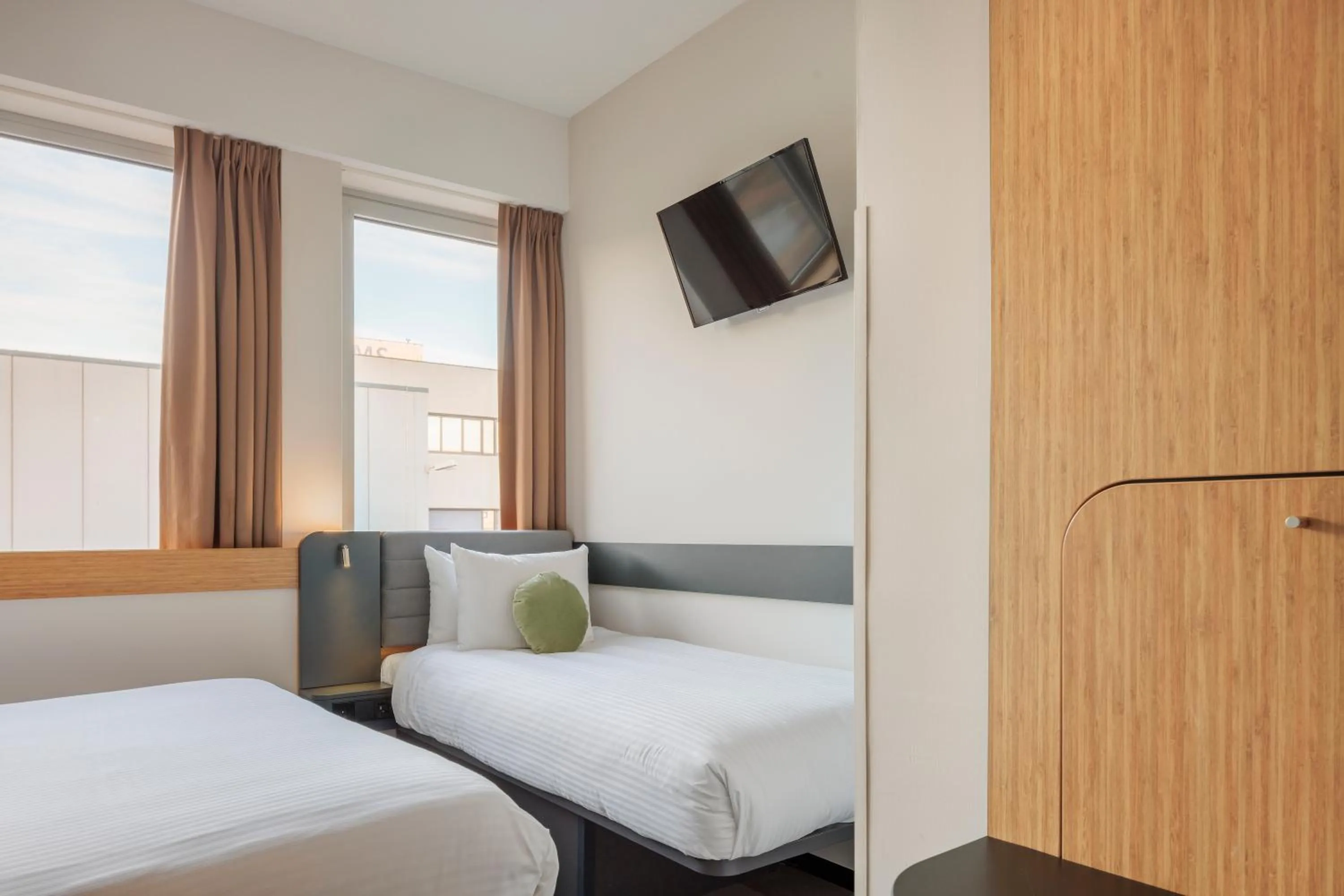 Bedroom, Bed in Maxhotel Amsterdam Airport Schiphol - Recently Renovated