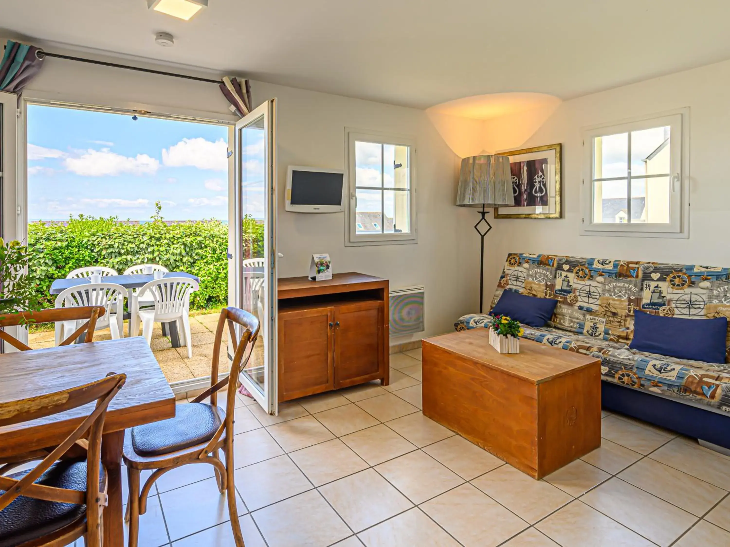 Living room in Vacancéole - Résidence Les Terrasses de Pentrez-Plage Living room in Vacancéole - Résidence Les Terrasses de Pentrez-Plage