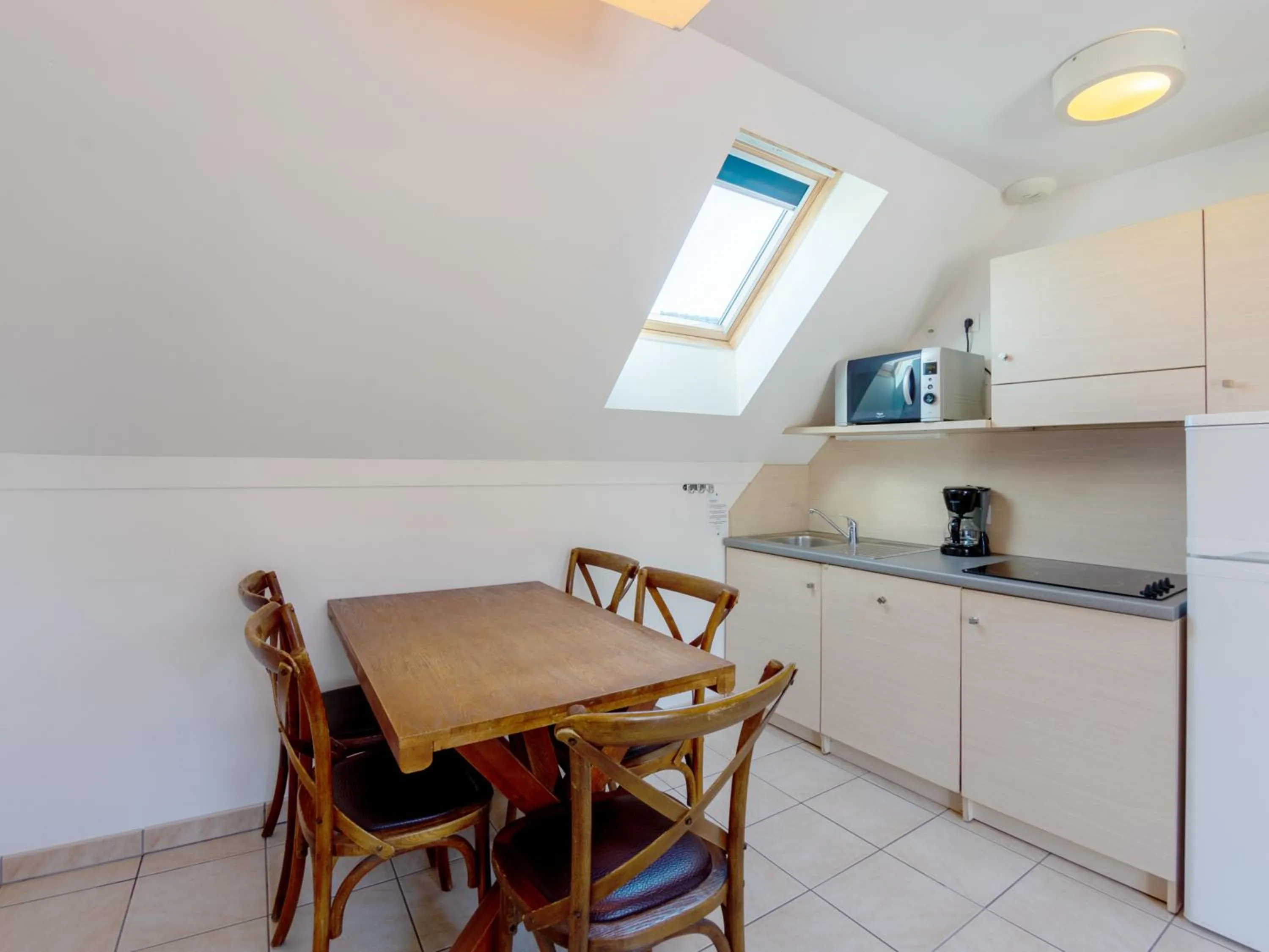 Kitchen or kitchenette in Vacancéole - Résidence Les Terrasses de Pentrez-Plage