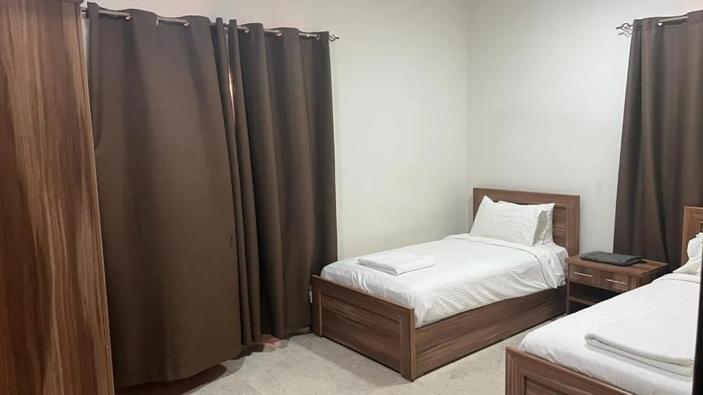 Bed in BAITI Furnished Apartments