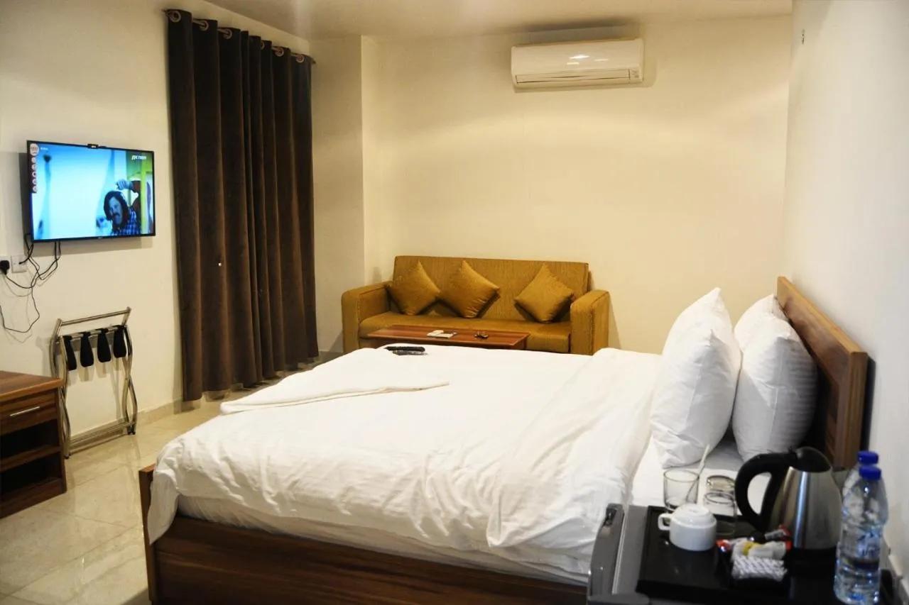 Bed in BAITI Furnished Apartments
