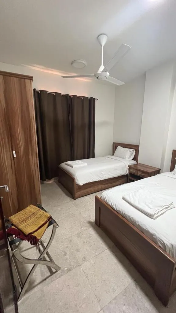 Bed in BAITI Furnished Apartments