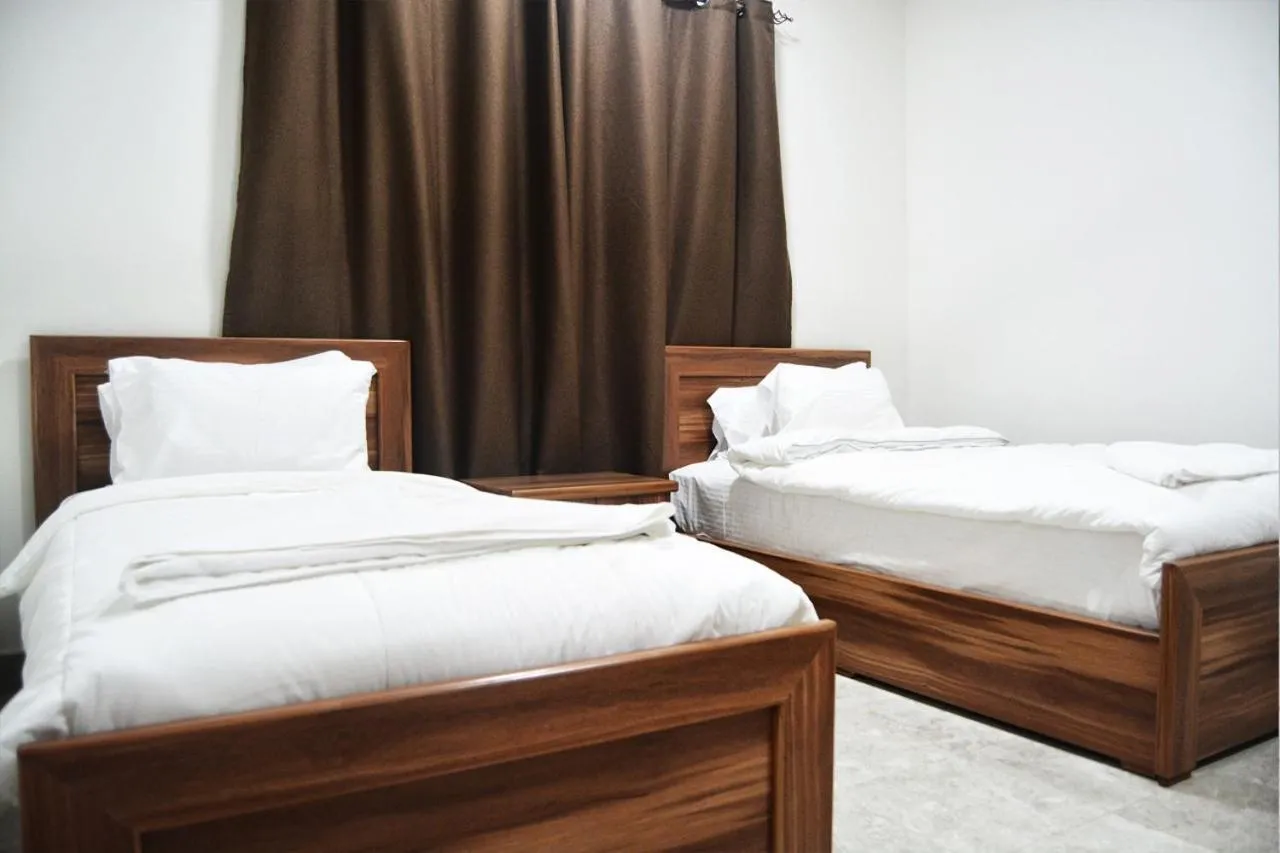 Bed in BAITI Furnished Apartments