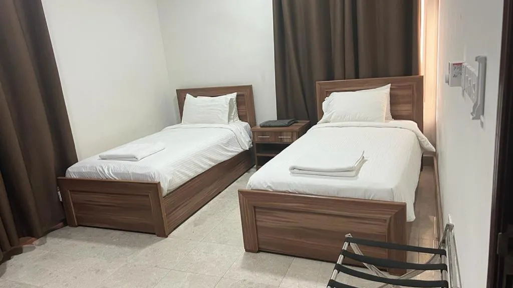 Bed in BAITI Furnished Apartments