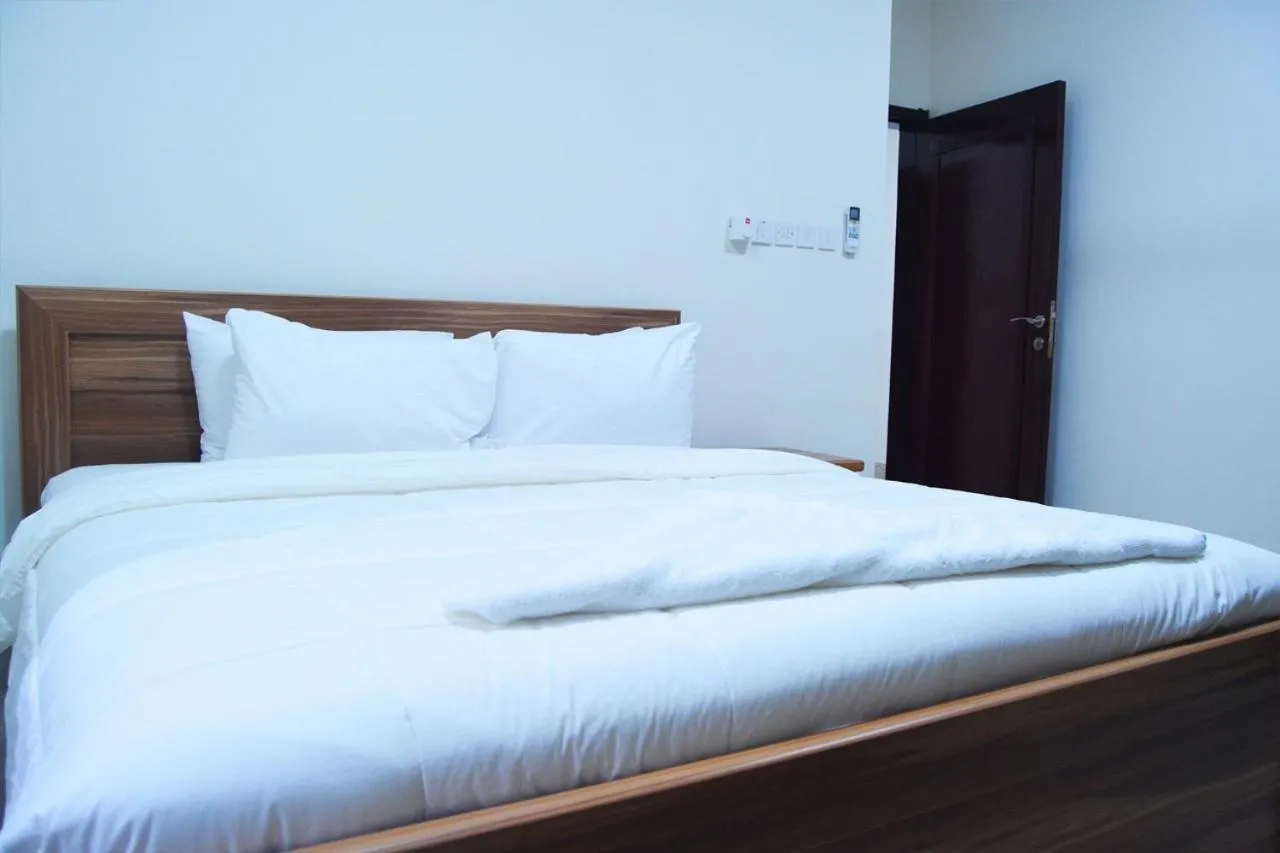 Bed in BAITI Furnished Apartments