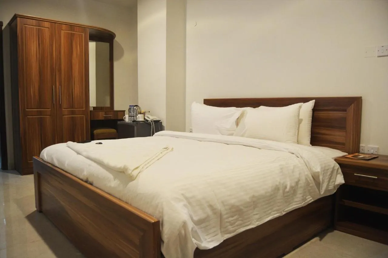 Bed in BAITI Furnished Apartments
