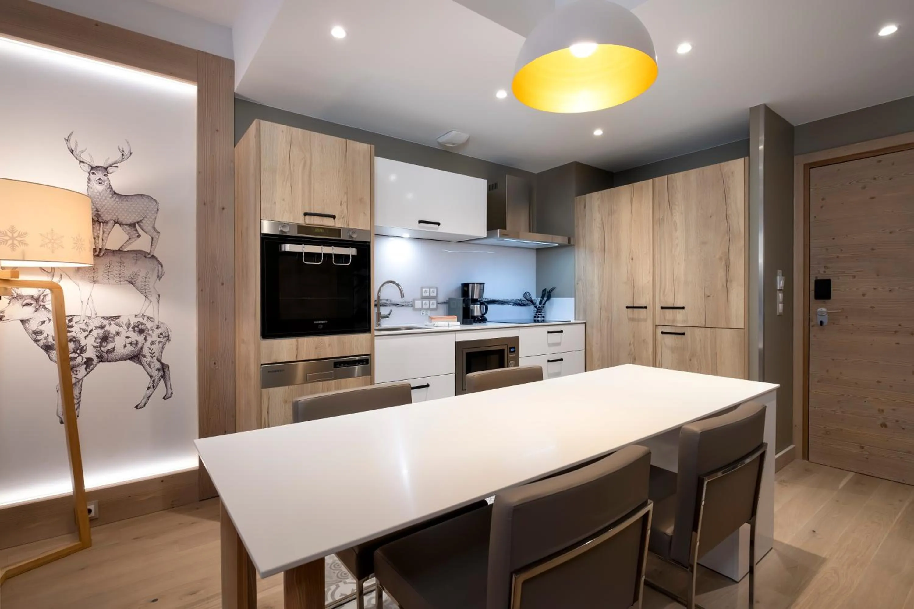 Kitchen or kitchenette in Résidence Pierre & Vacances Premium L'Hévana