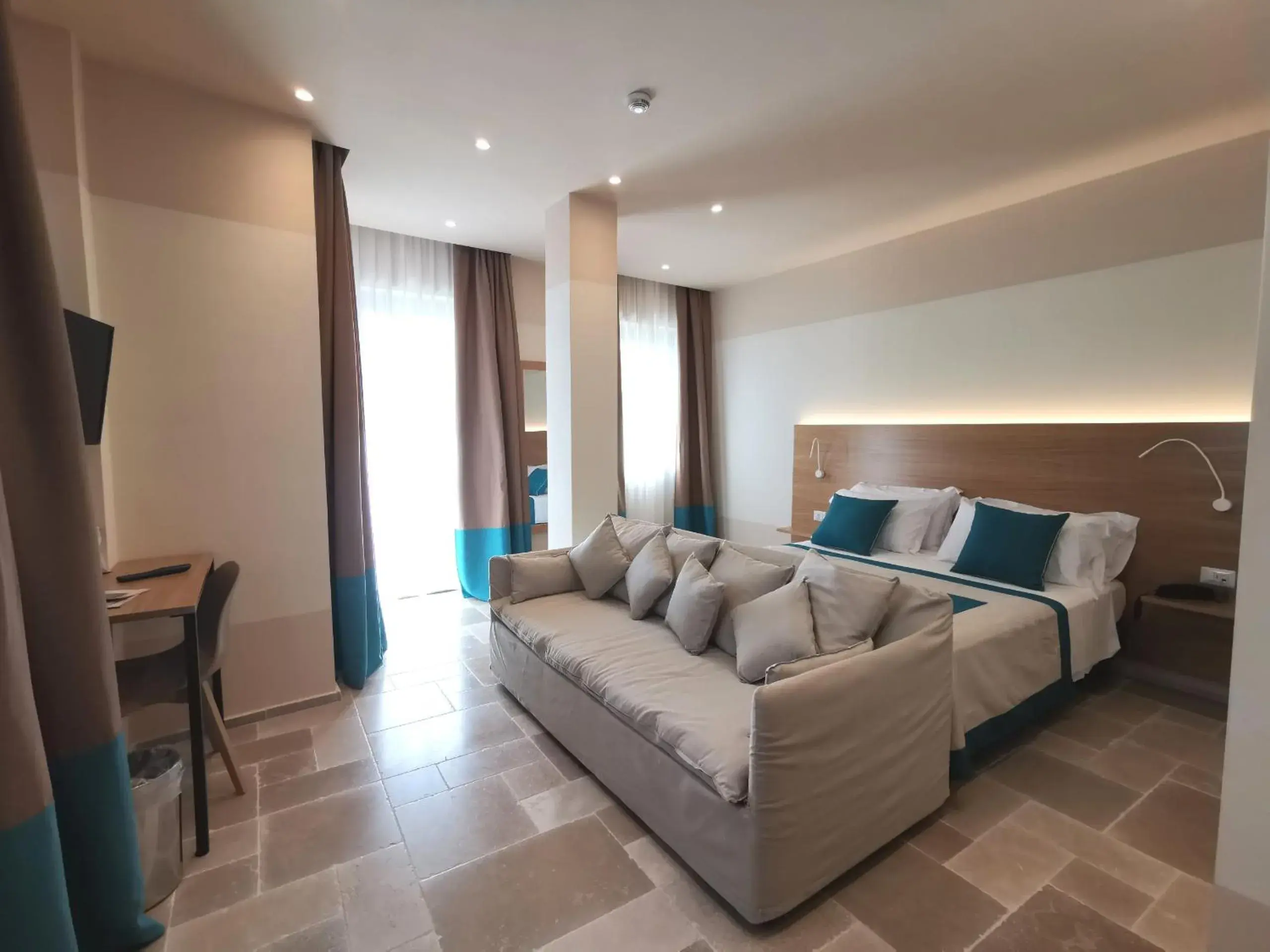 Quadruple Room with Sea View in Maison Montechiaro Quadruple Room with Sea View in Maison Montechiaro