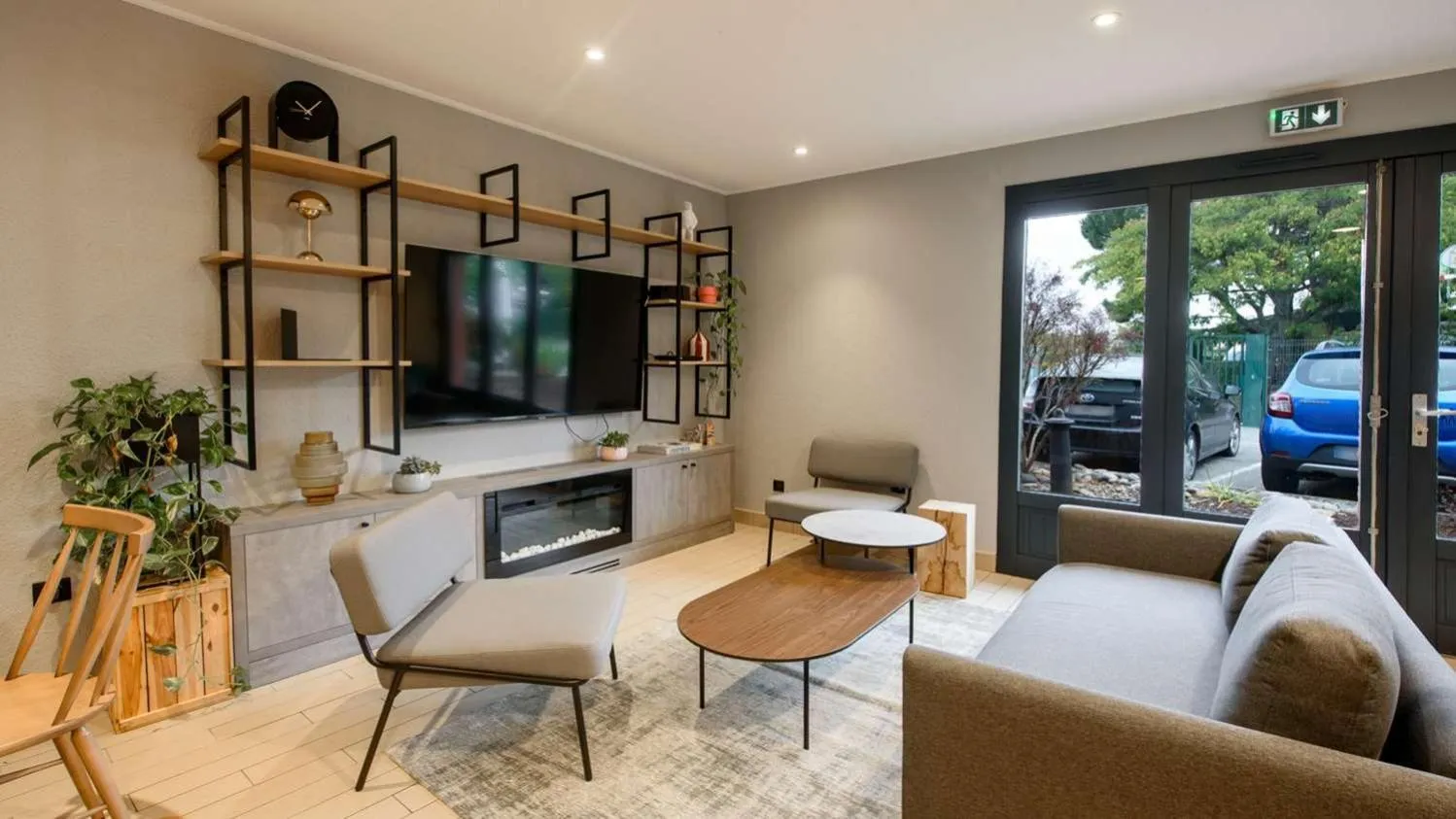 Communal lounge/ TV room in Campanile NATURE - Toulouse Nord L'Union