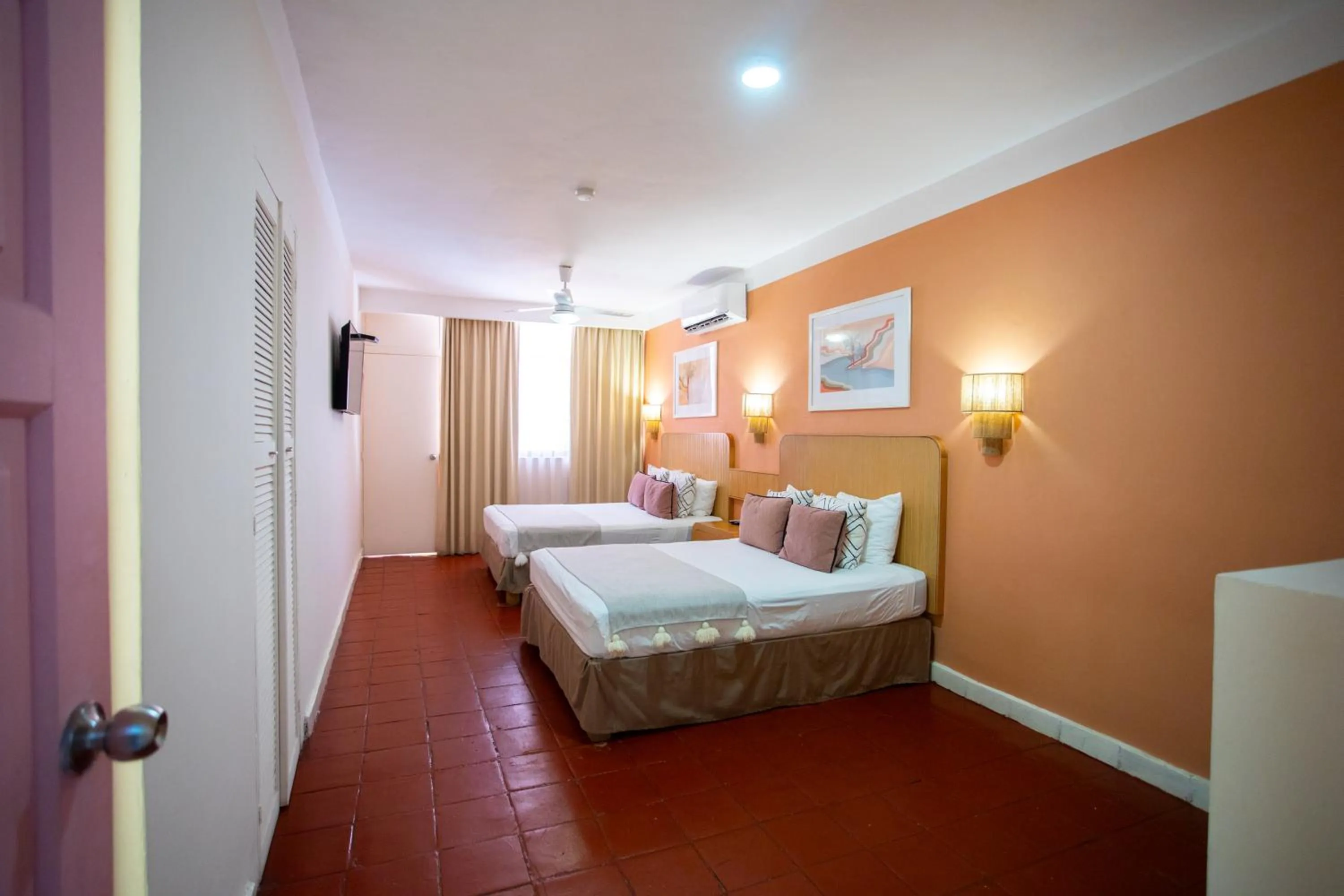 Bed in Hotel Tropicus Boutique