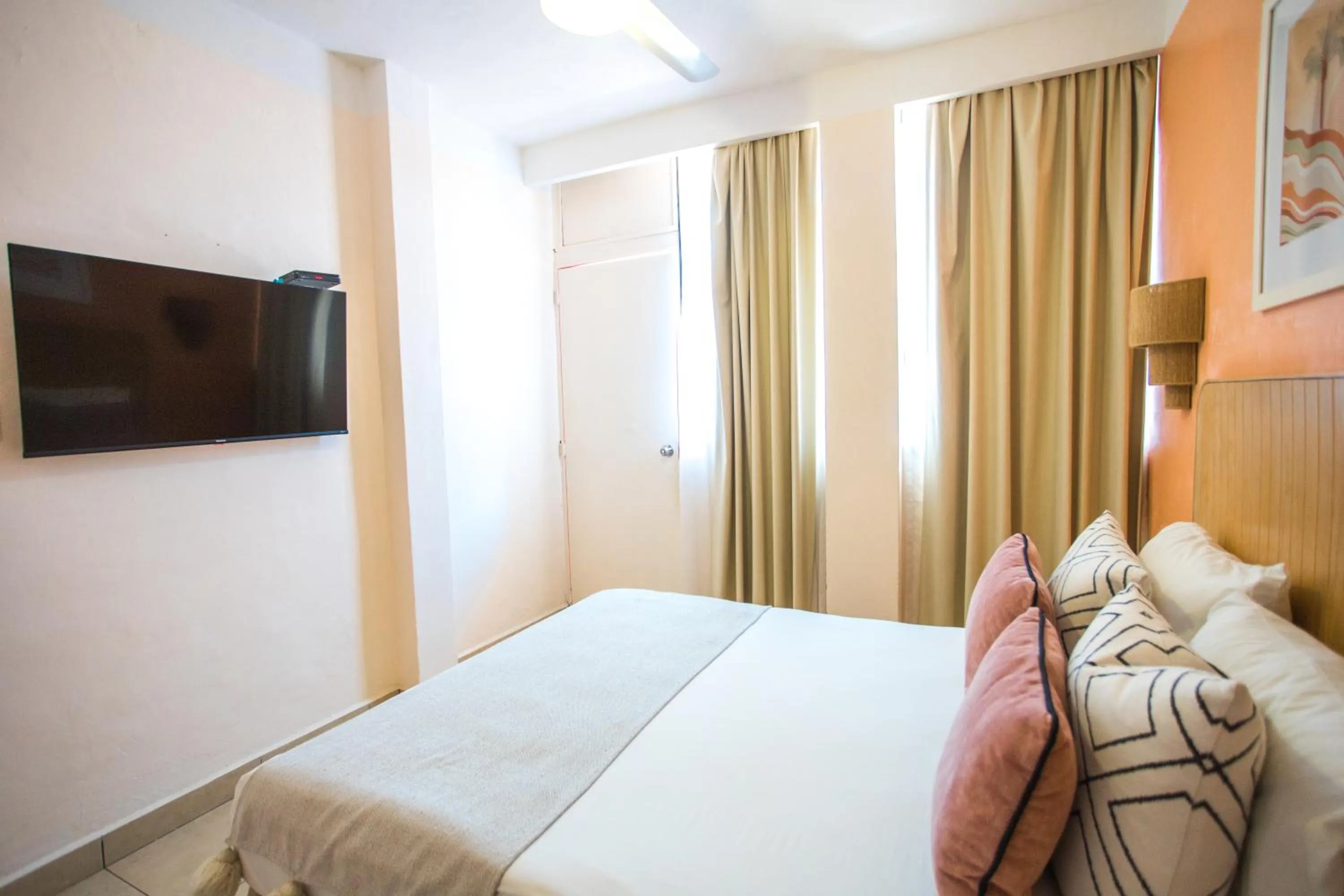 Bed in Hotel Tropicus Boutique