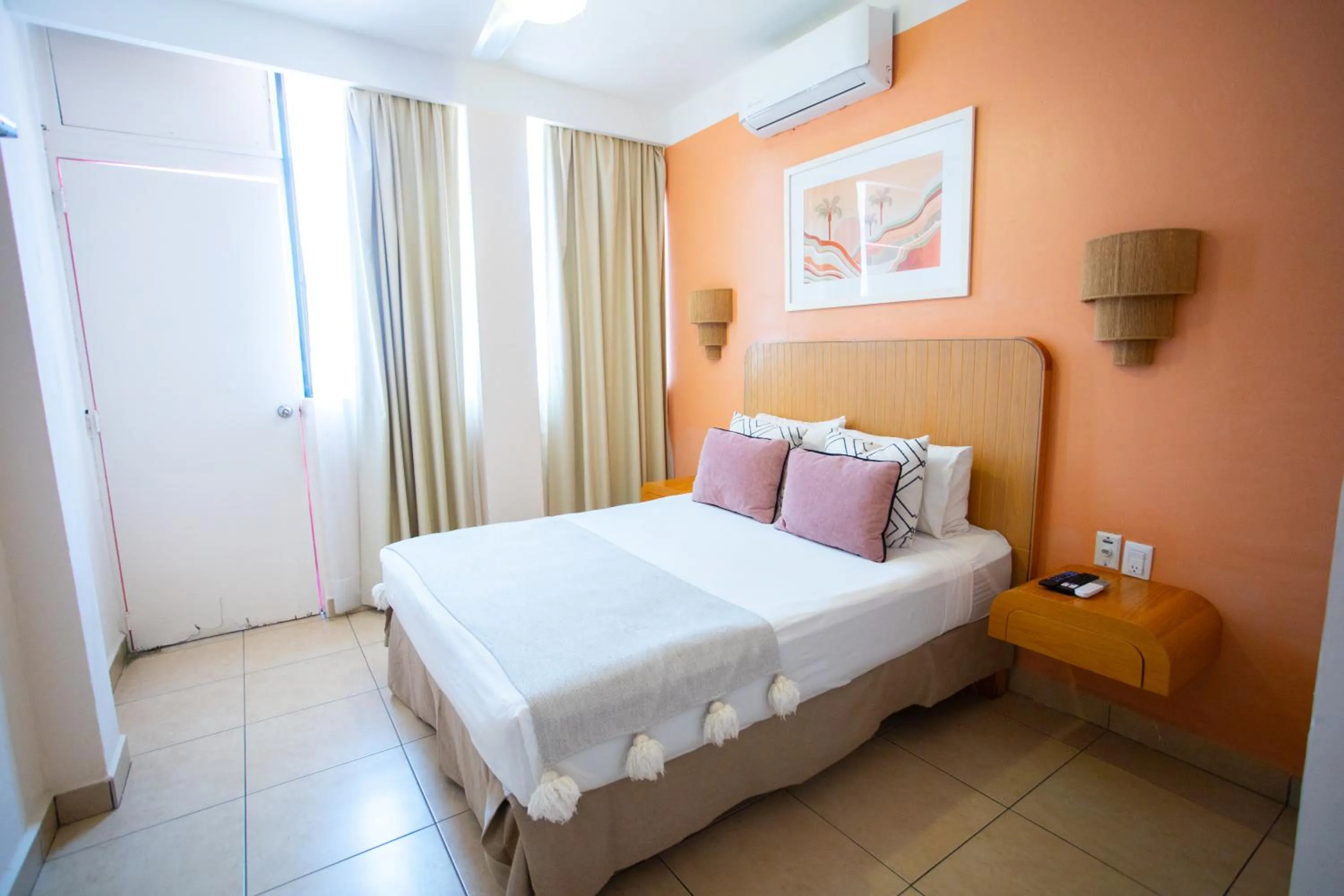 Bed in Hotel Tropicus Boutique