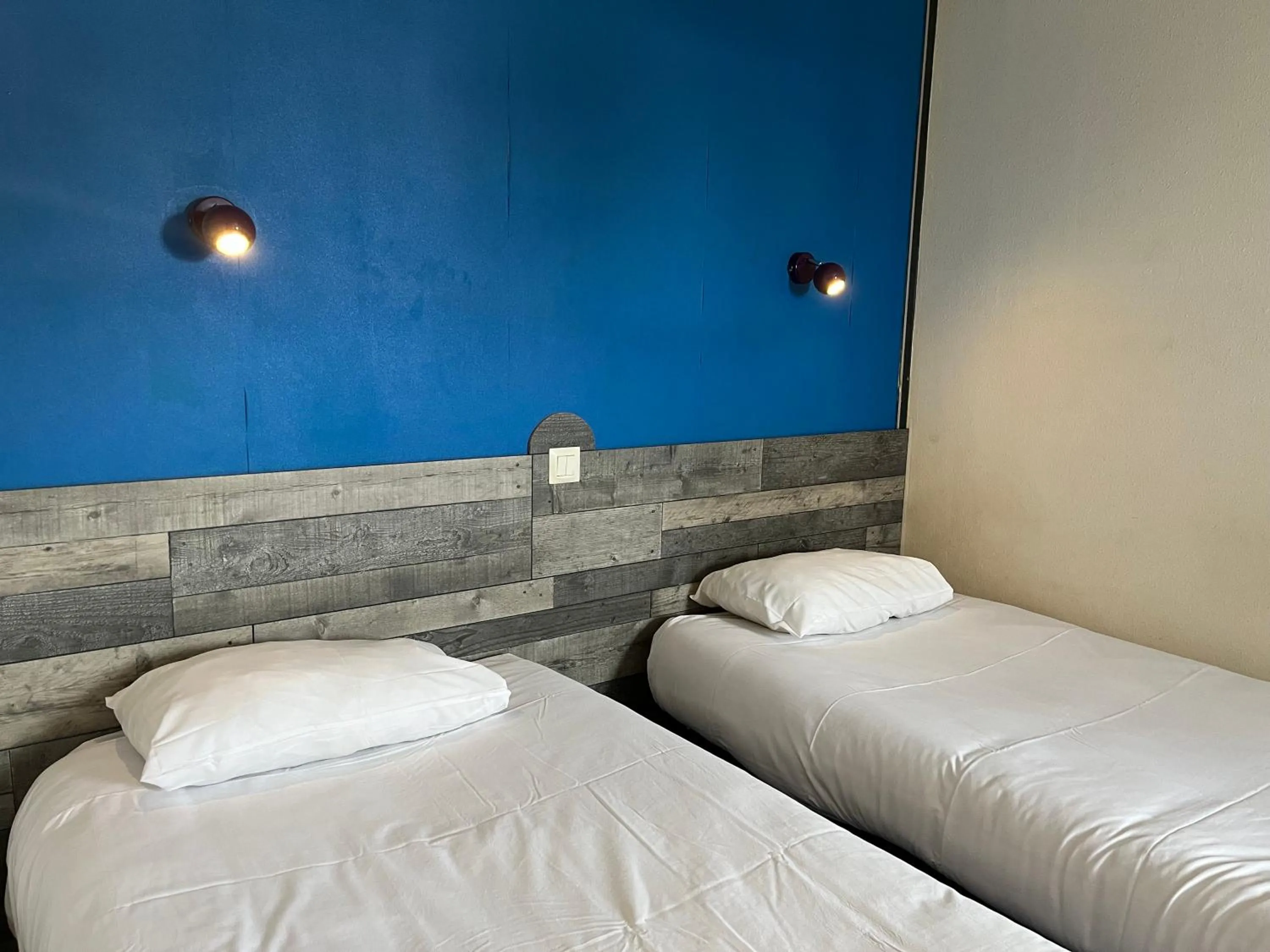 Bed in Kyriad Direct Macon Sud