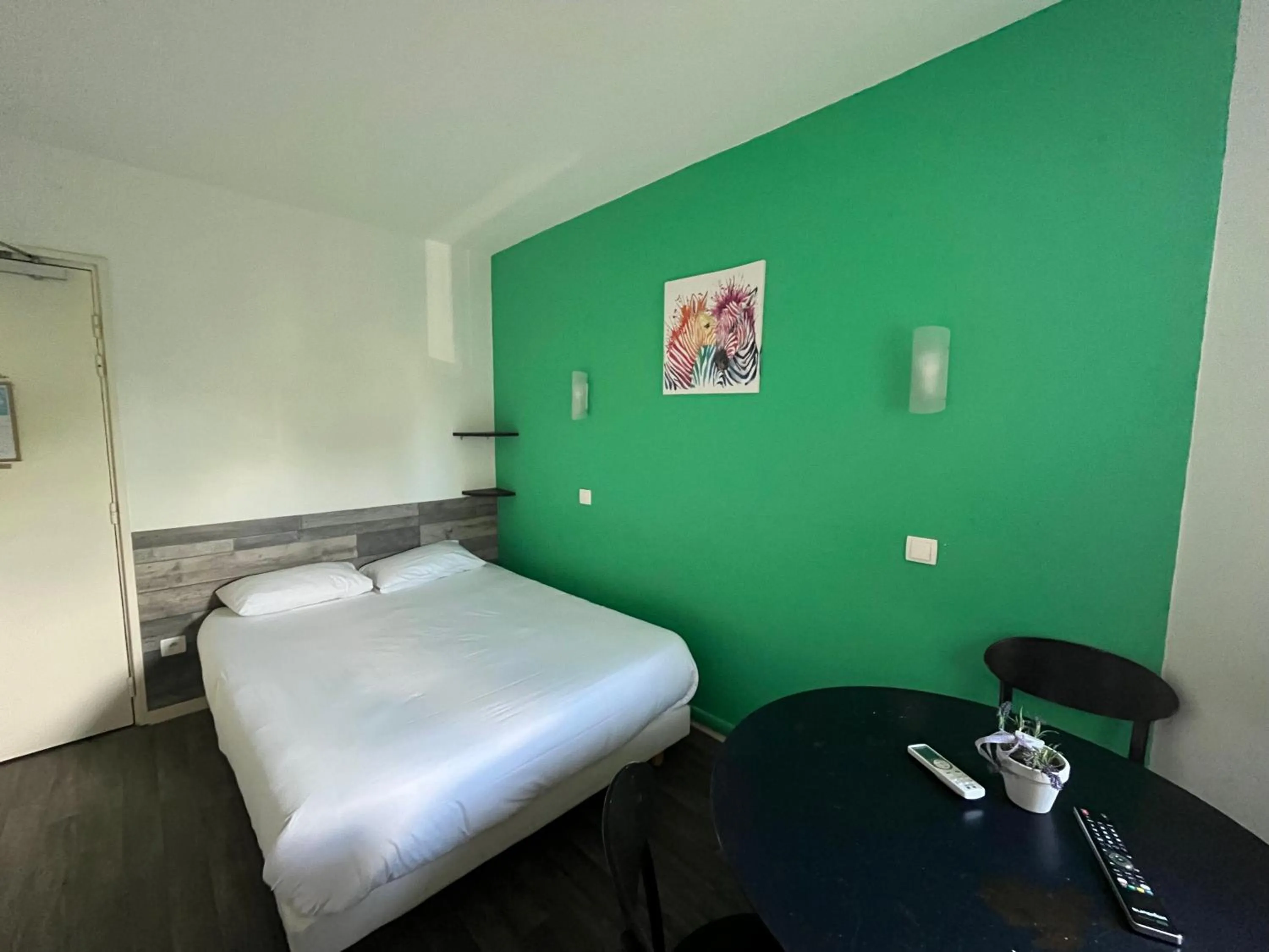 Bed in Kyriad Direct Macon Sud