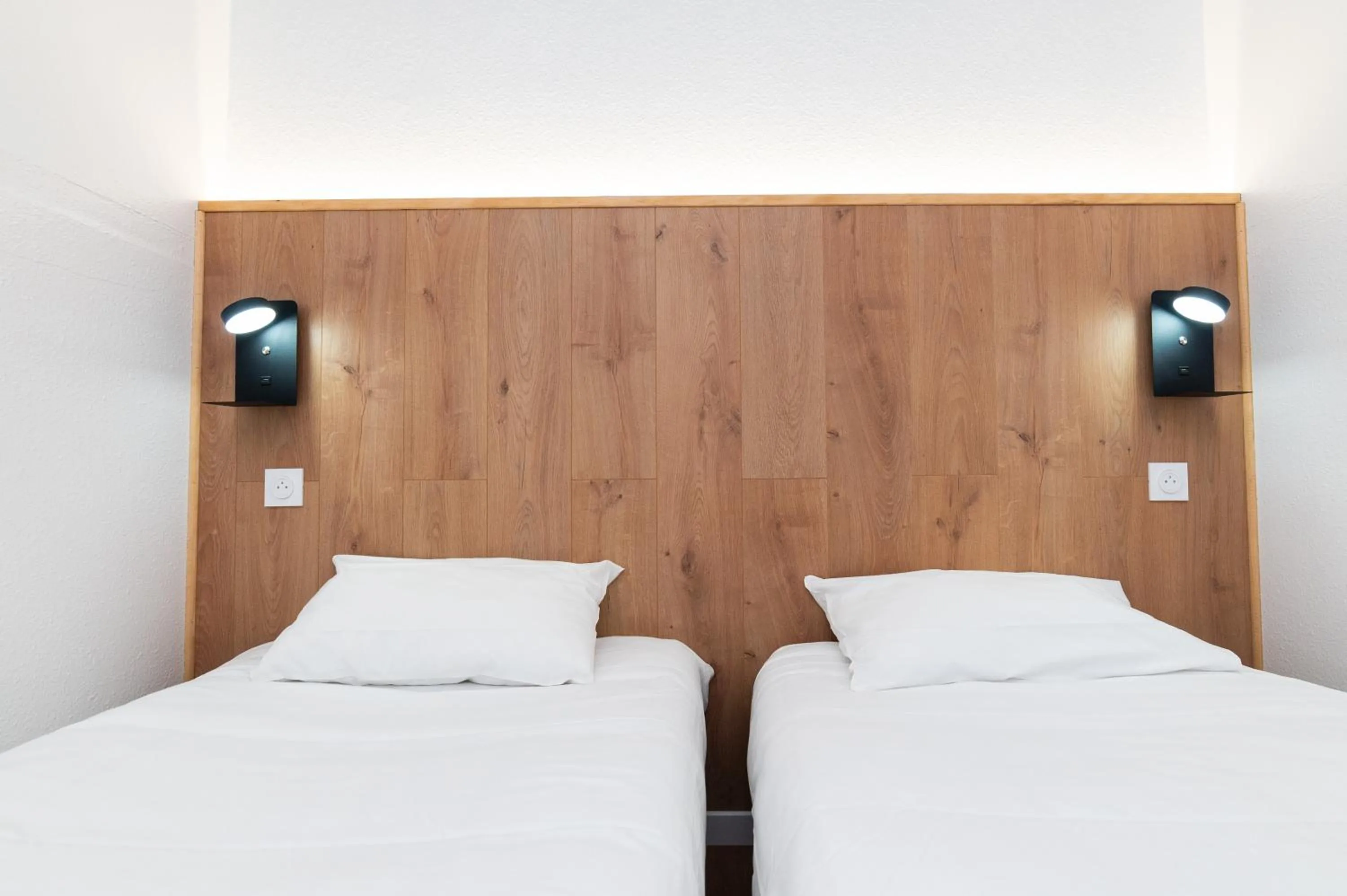 Bed in Kyriad Direct Macon Sud