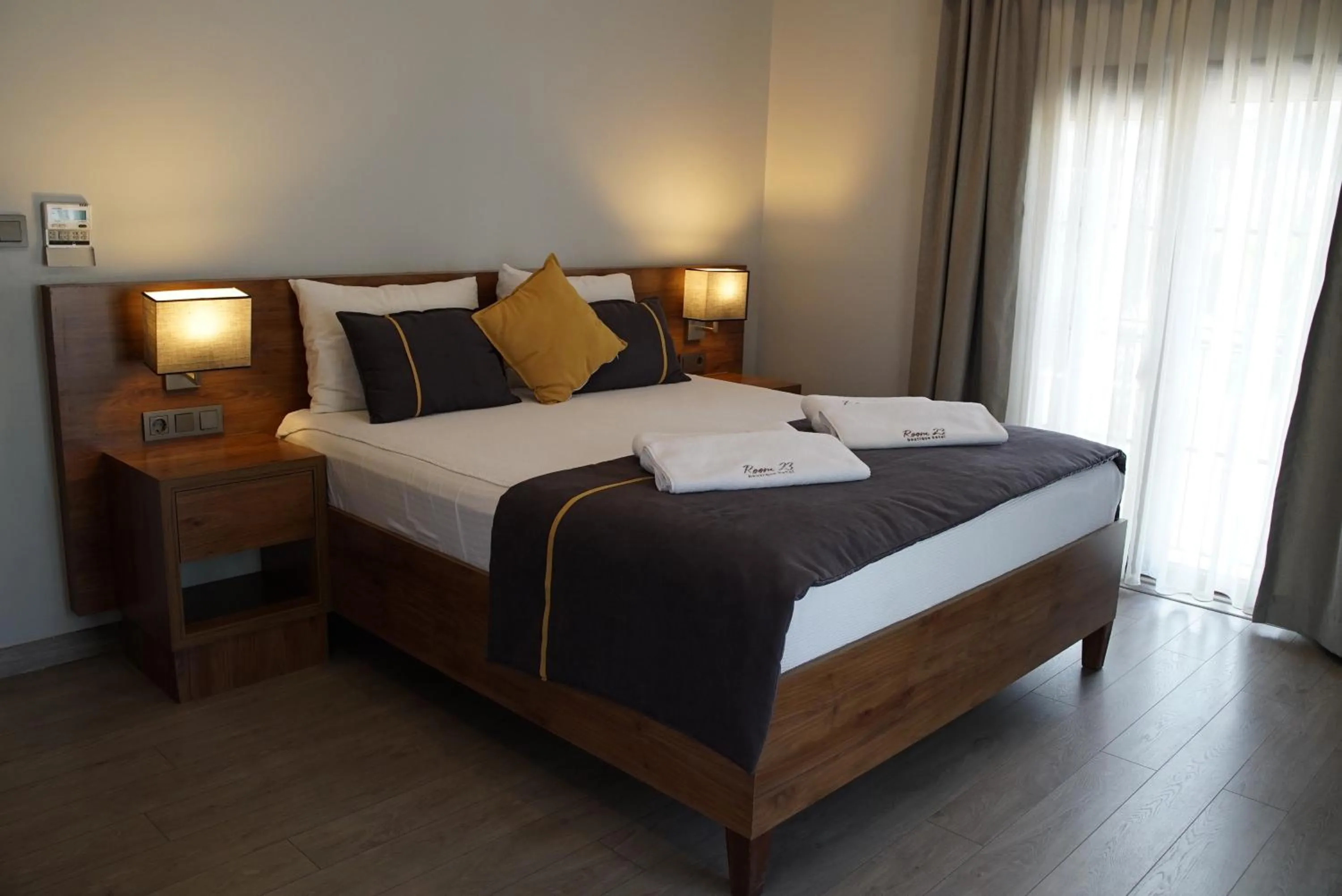 Bed in Room 23 Hotel