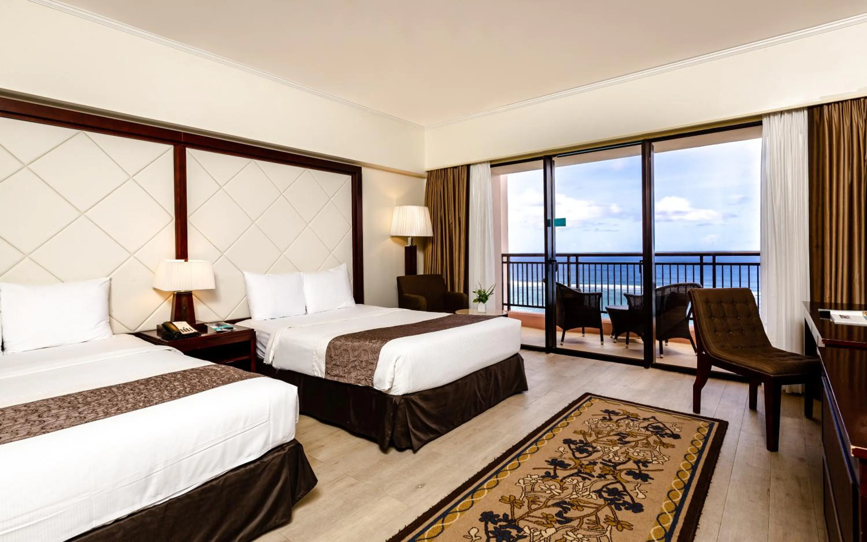 Photo of the whole room, Bed in Pacific Islands Club Guam