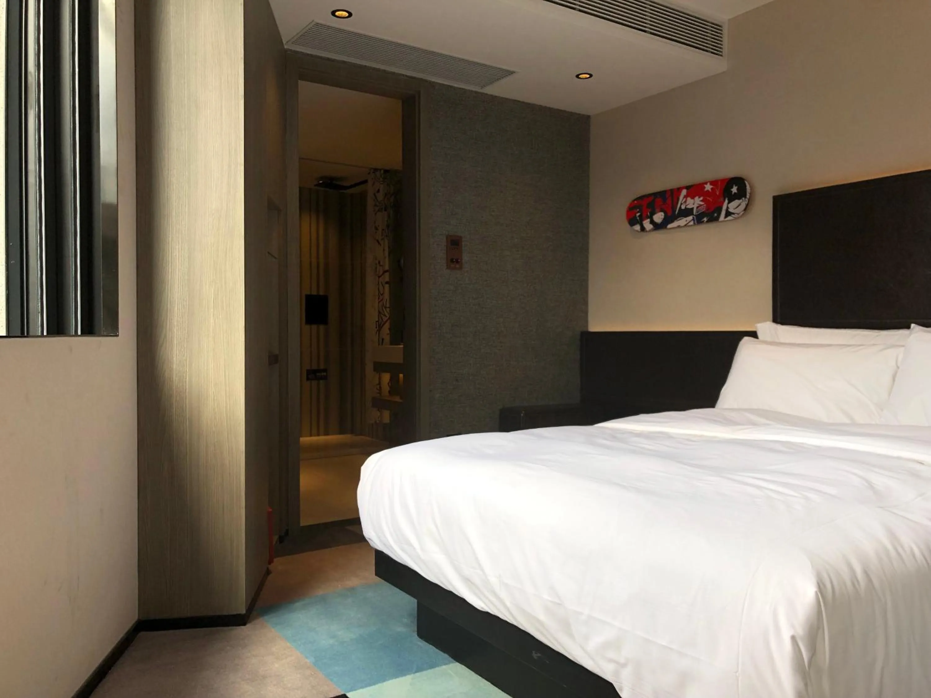 Bed in Fenk Attitude Hotel Guangzhou Railway Station