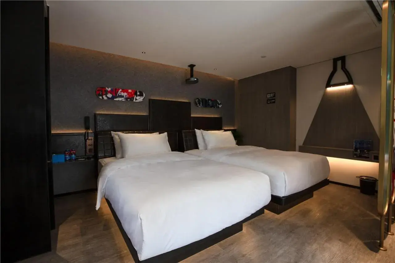 Bed in Fenk Attitude Hotel Guangzhou Railway Station Bed in Fenk Attitude Hotel Guangzhou Railway Station