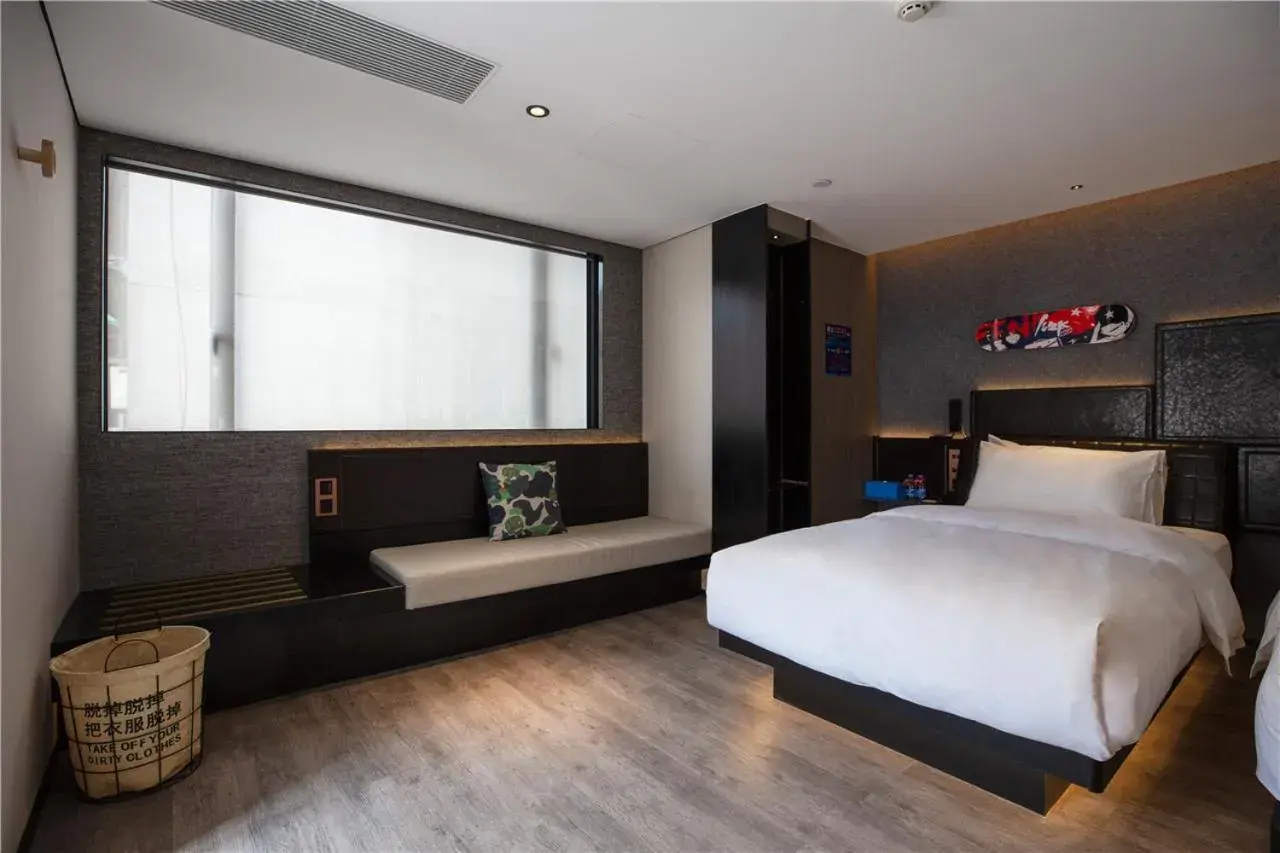 Bed in Fenk Attitude Hotel Guangzhou Railway Station Bed in Fenk Attitude Hotel Guangzhou Railway Station