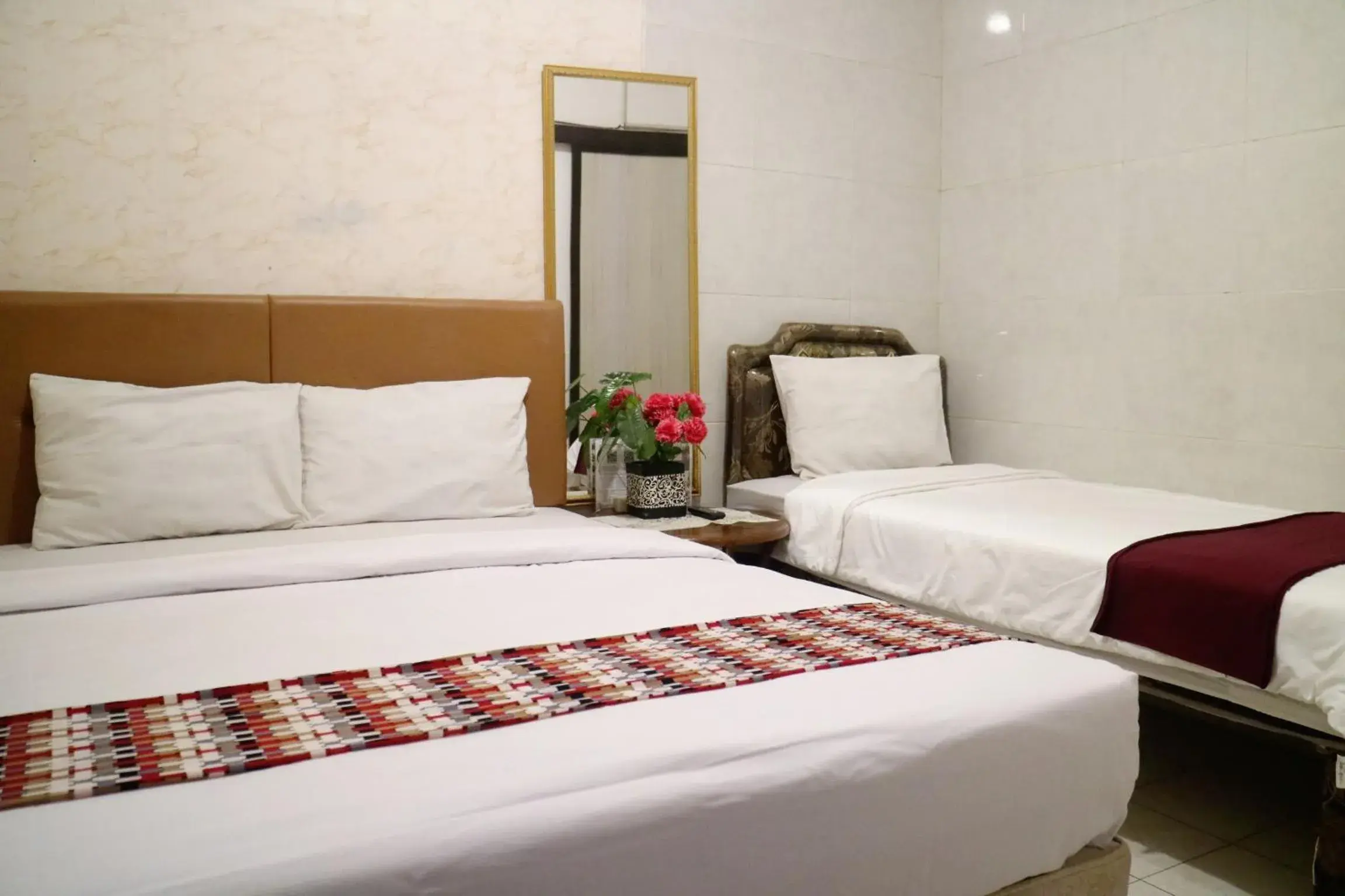 Triple Room with Garden View in The Homey Rooms and Tours Triple Room with Garden View in The Homey Rooms and Tours