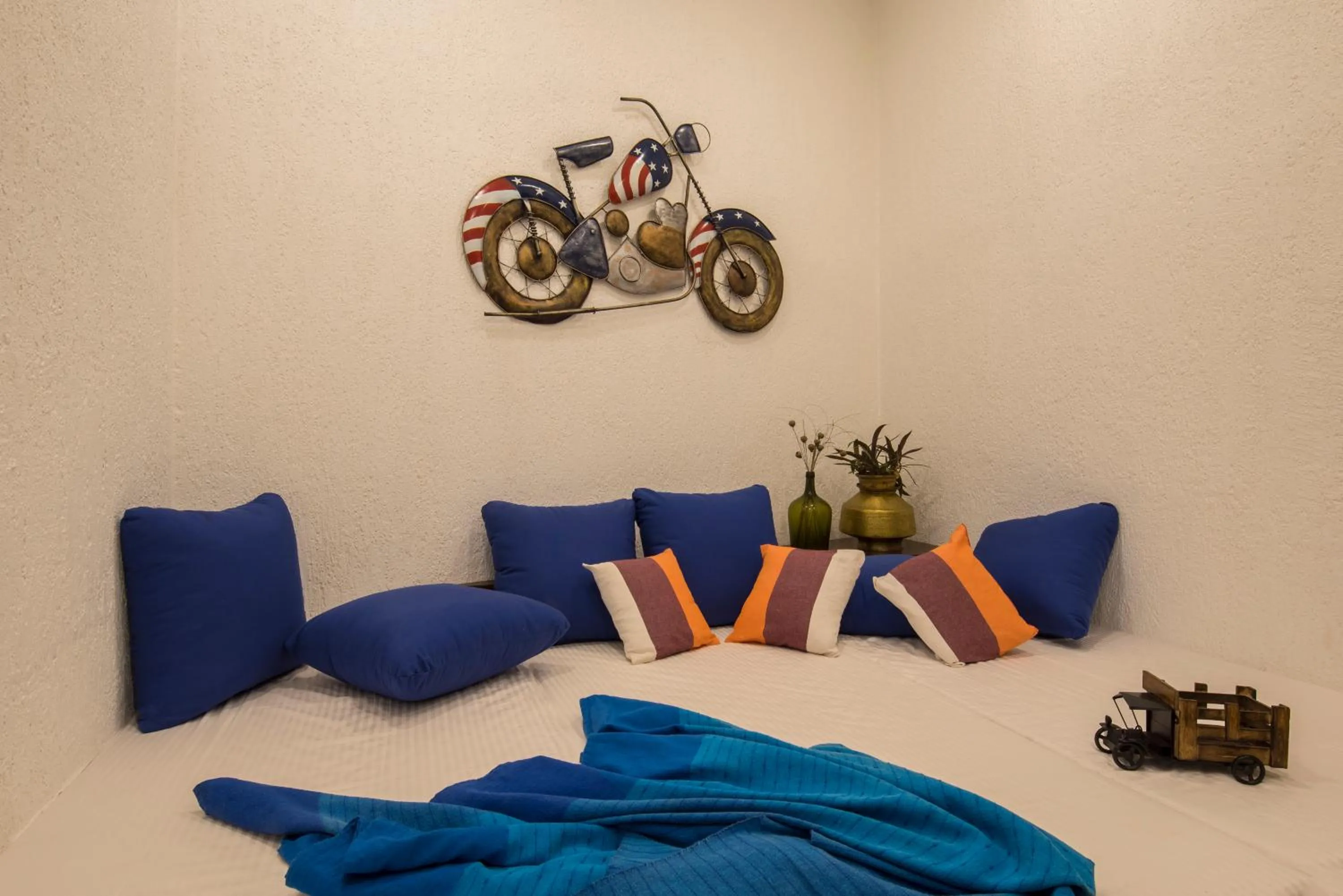Bedroom in EL Lodge by StayVista - Pool, lawn, and a charming gazebo for your perfect getaway