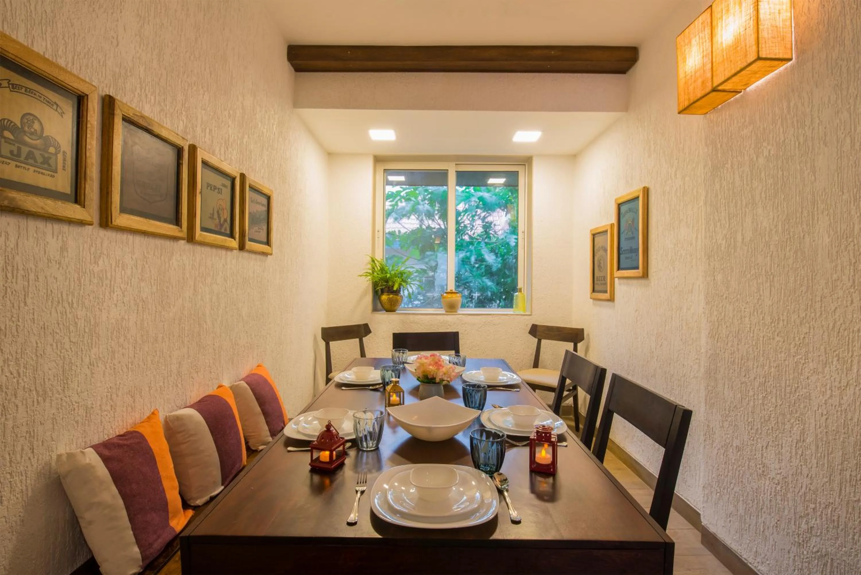 Dining area in EL Lodge by StayVista - Pool, lawn, and a charming gazebo for your perfect getaway