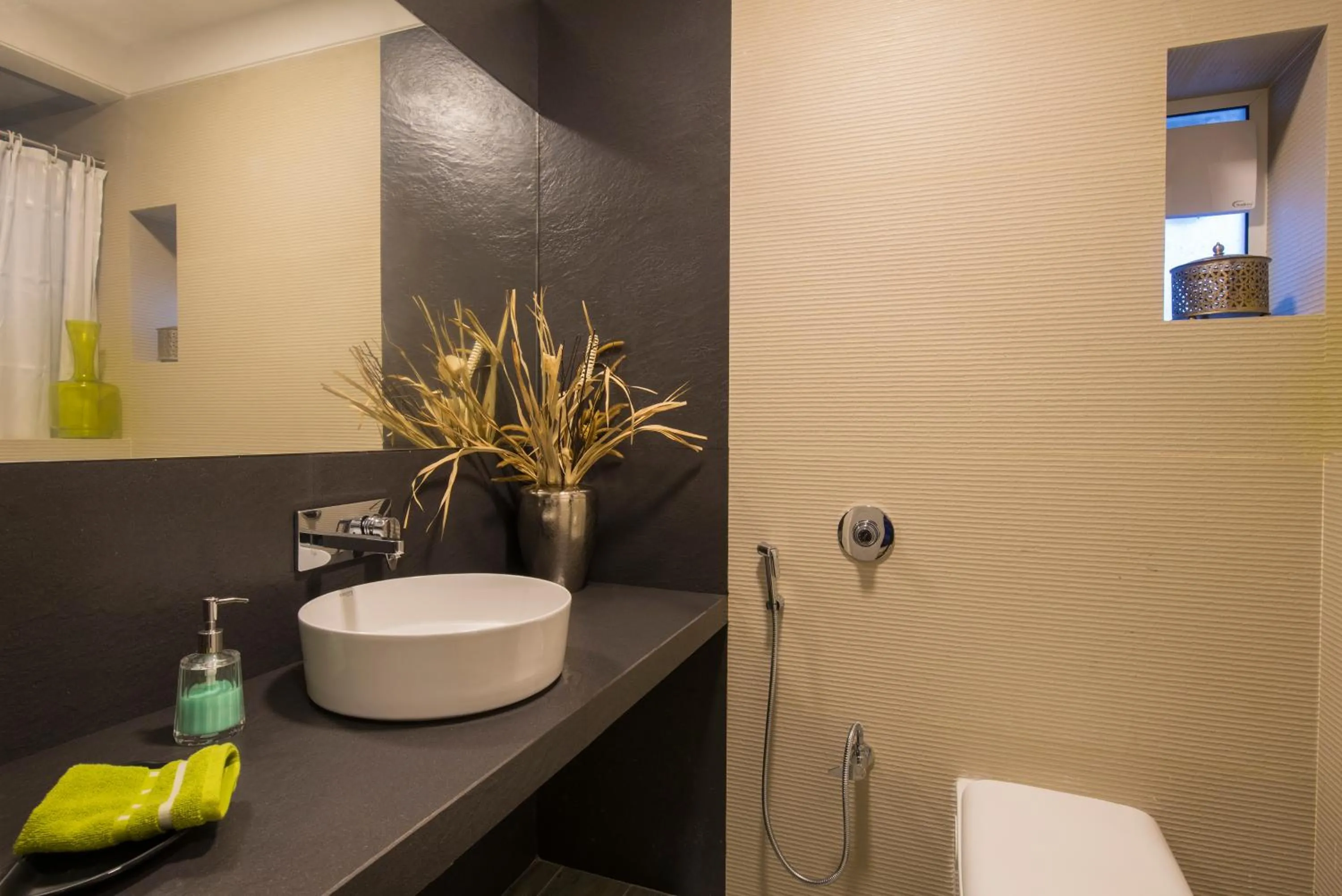 Bathroom in EL Lodge by StayVista - Pool, lawn, and a charming gazebo for your perfect getaway