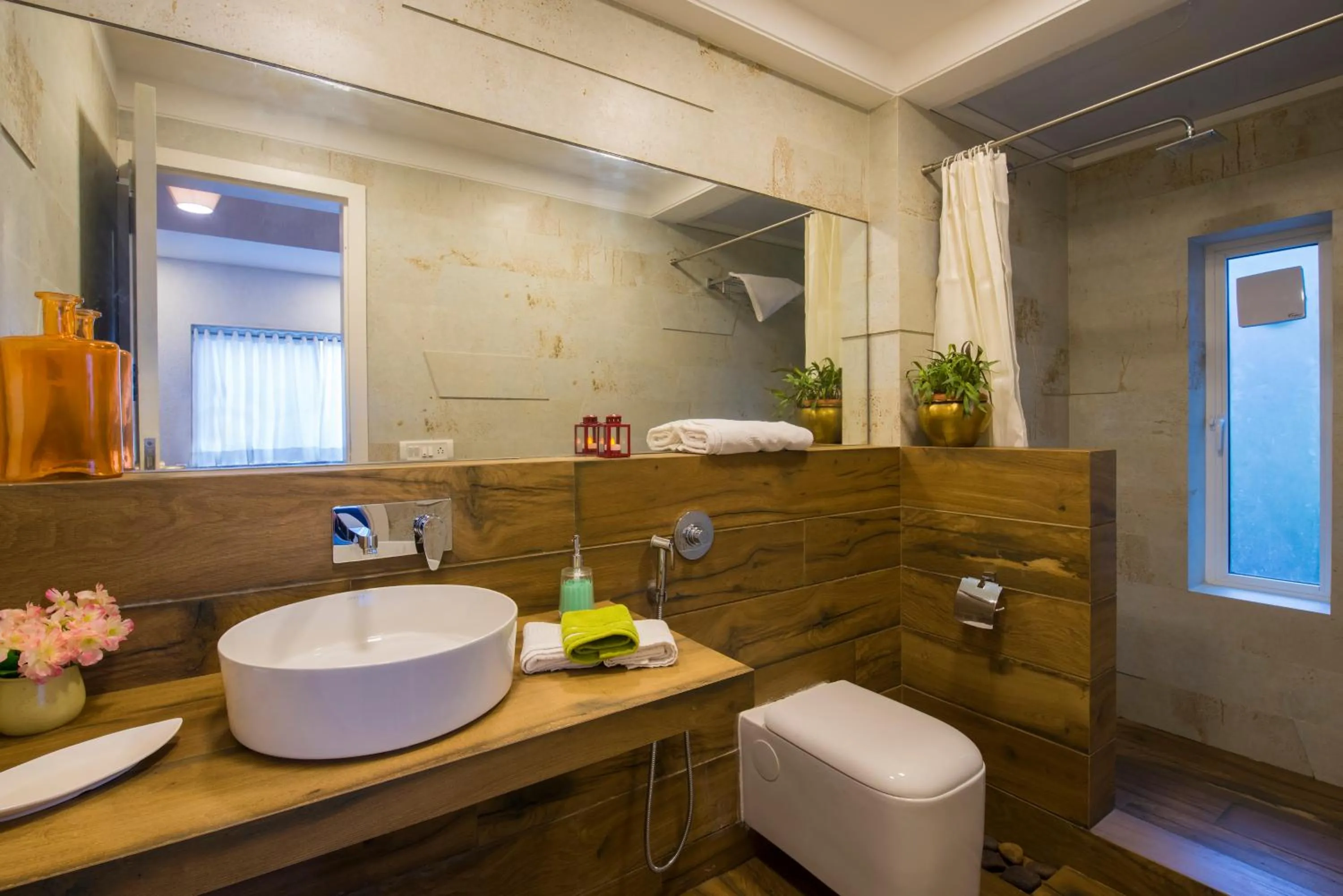 Bathroom in EL Lodge by StayVista - Pool, lawn, and a charming gazebo for your perfect getaway