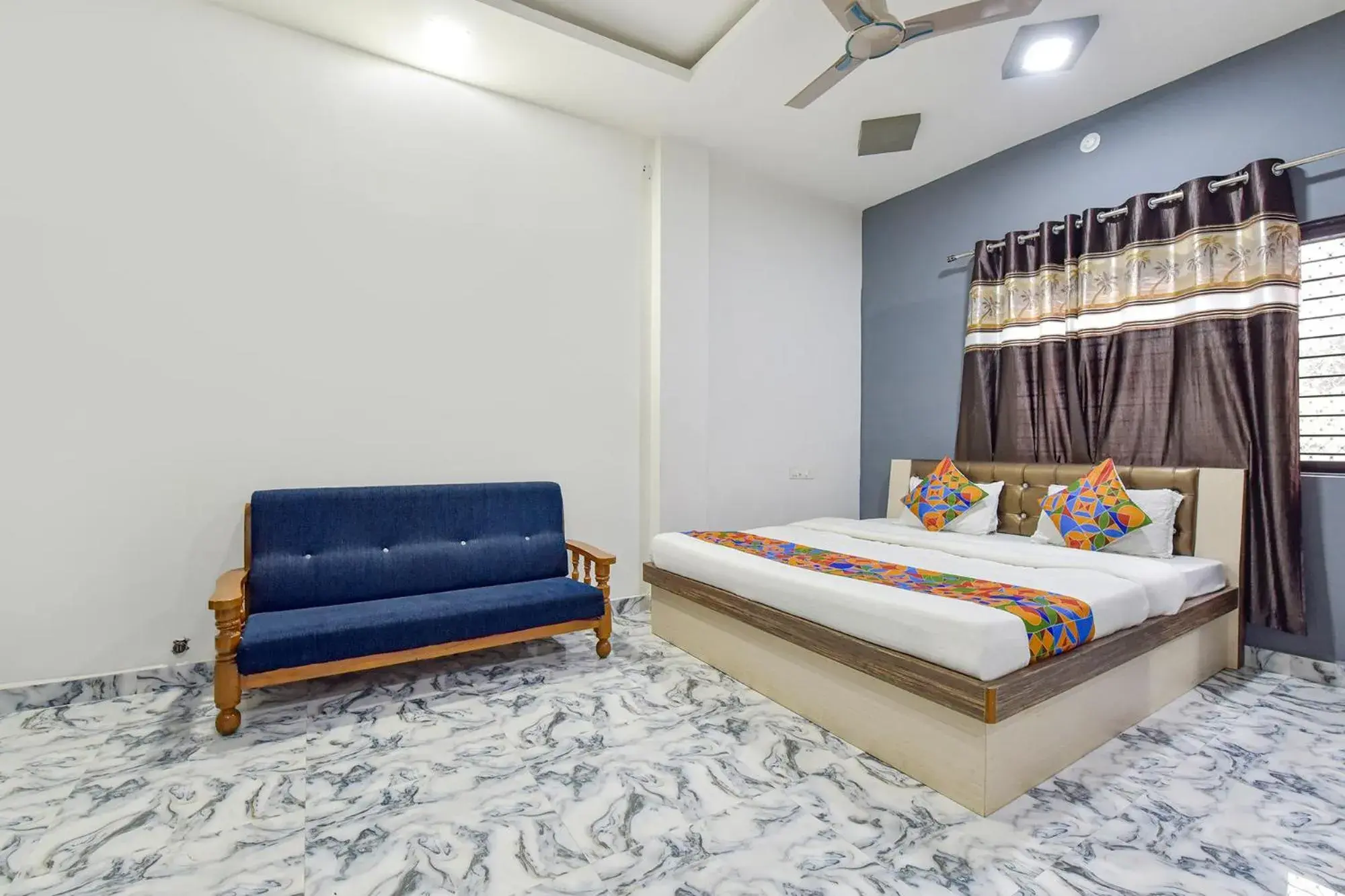 Bed in FabHotel Soni Palace Bed in FabHotel Soni Palace