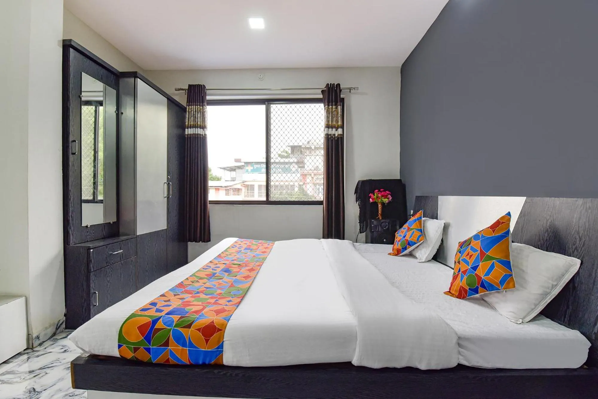 Bed in FabHotel Soni Palace