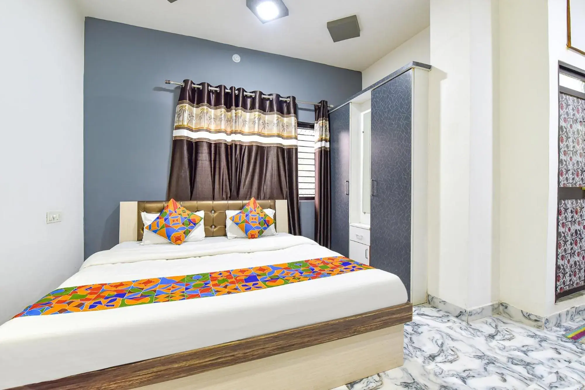 Bed in FabHotel Soni Palace Bed in FabHotel Soni Palace