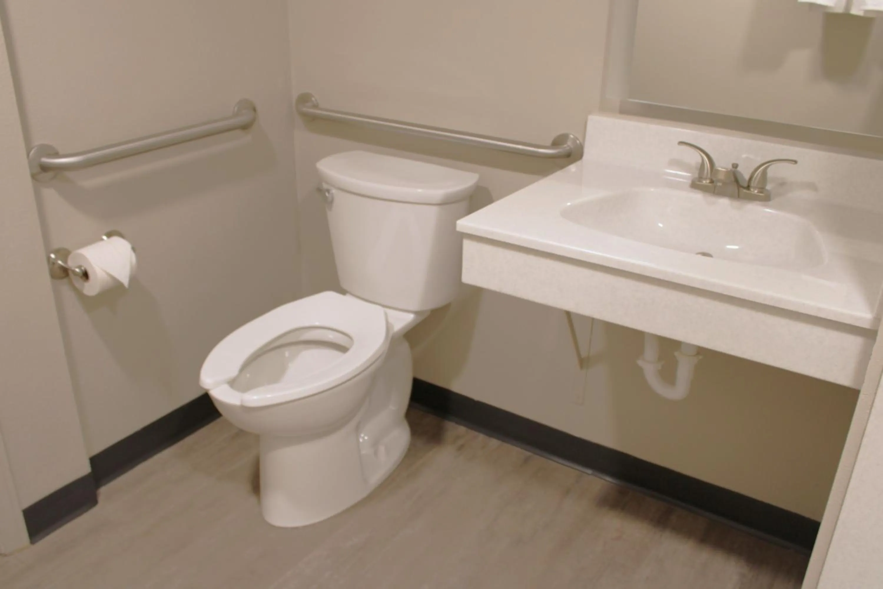 Toilet in Boarders Inn and Suites by Cobblestone Lamar Missouri