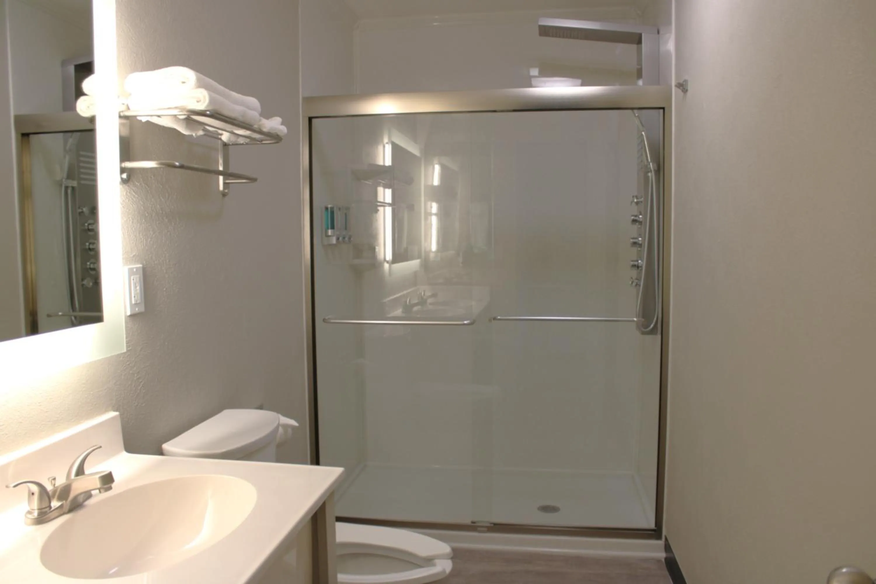 Shower in Boarders Inn and Suites by Cobblestone Lamar Missouri