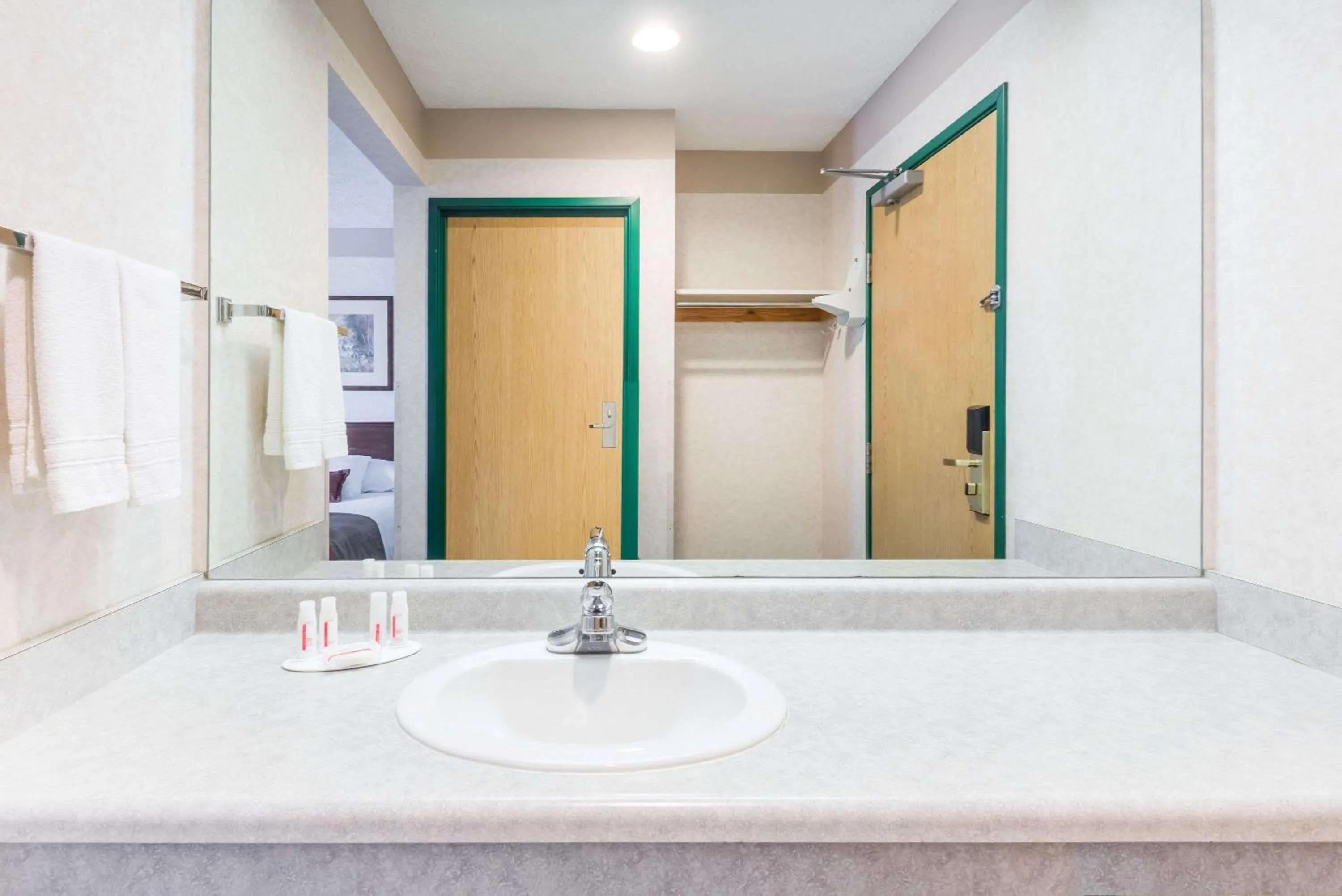 Bathroom in Ramada by Wyndham Strasburg Dover