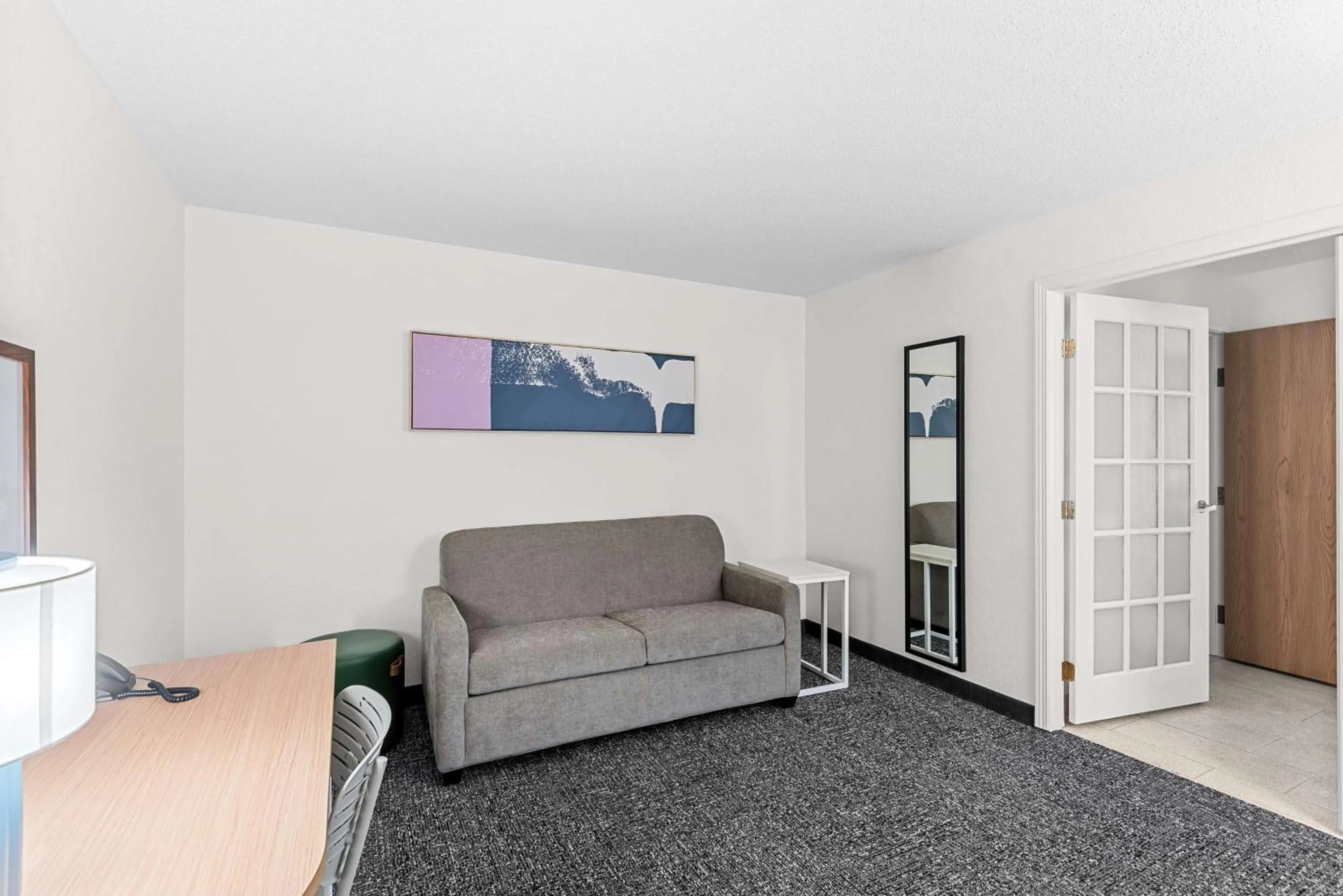 Living room in Spark by Hilton Cedar Falls