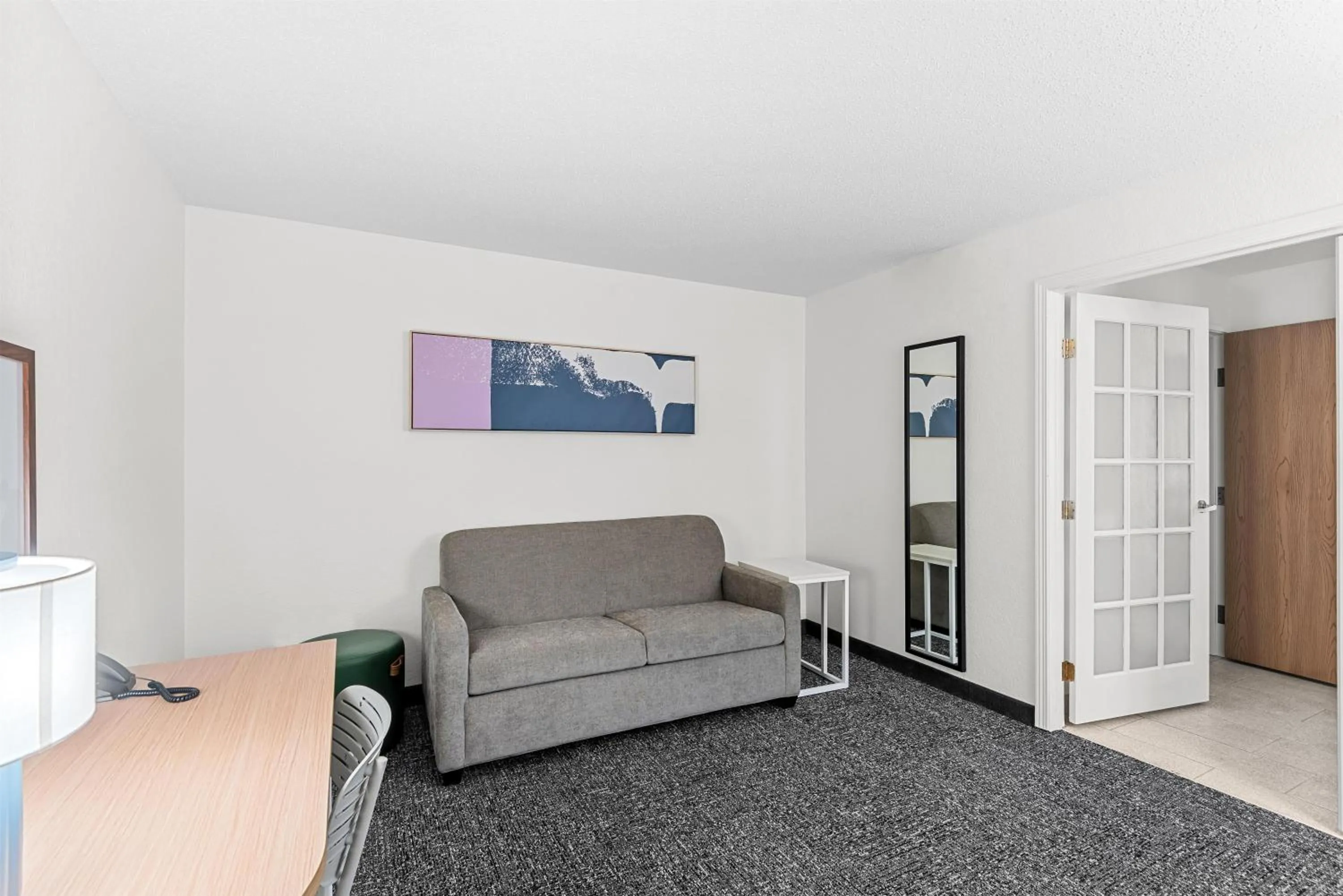 Living room in Spark by Hilton Cedar Falls